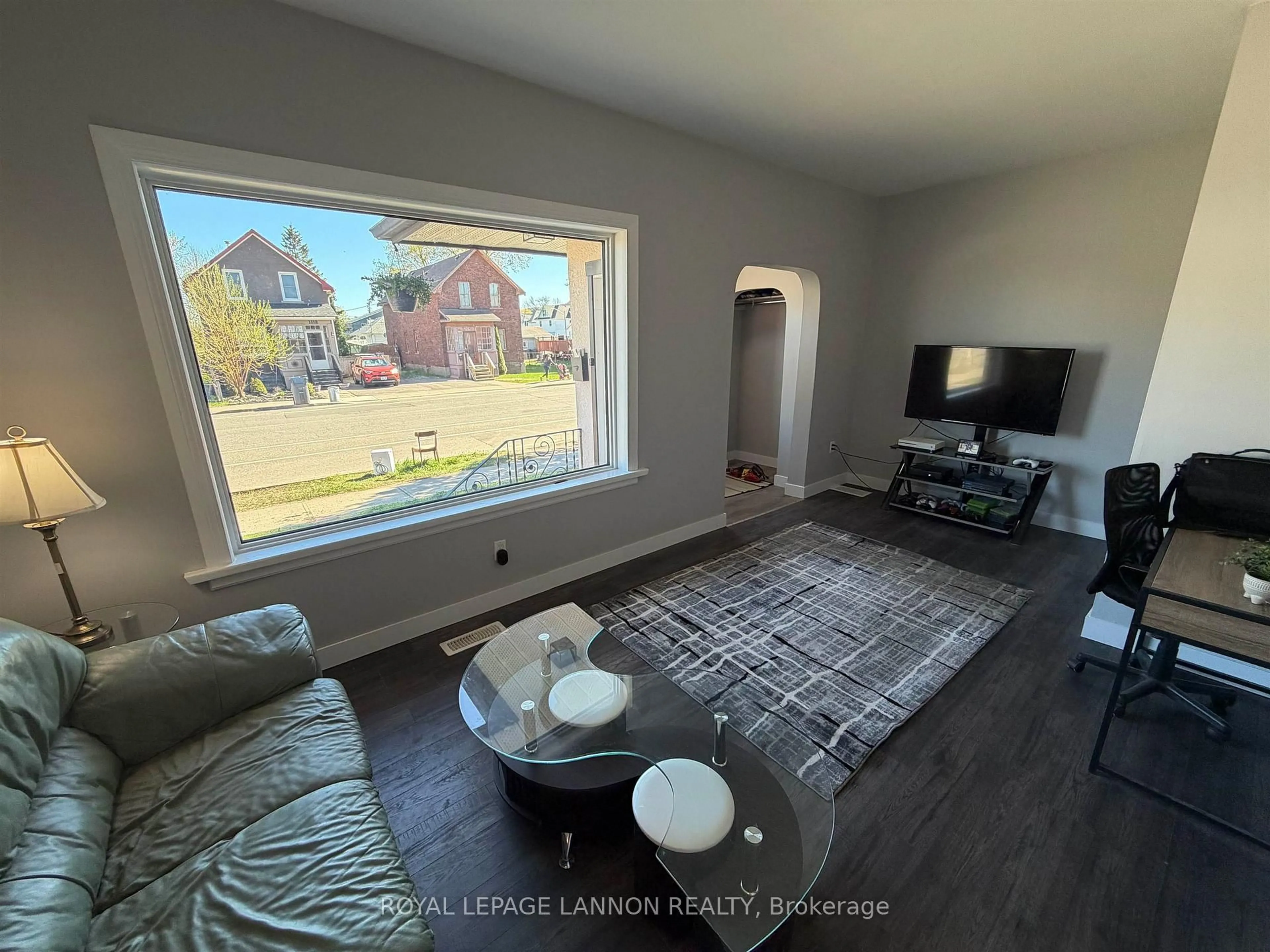 Living room with furniture, wood/laminate floor for 1113 Walsh St, Thunder Bay Ontario P7E 4V2