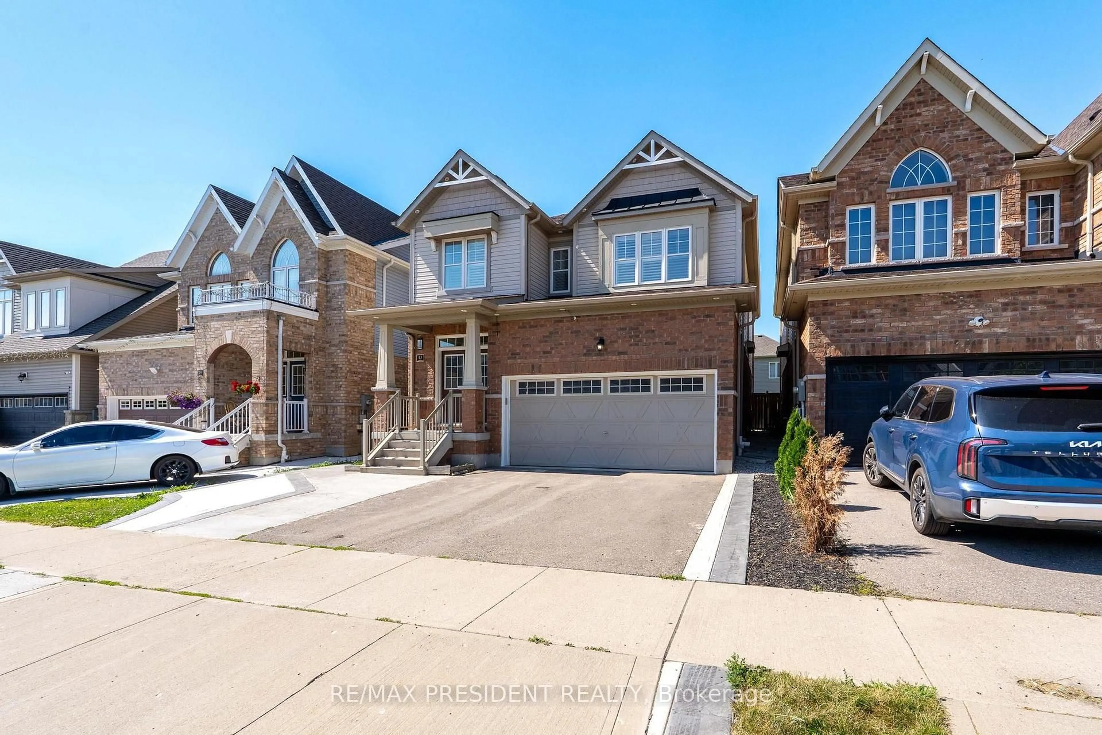 Home with brick exterior material, street for 43 Mullholland Ave, Cambridge Ontario N3H 0C3