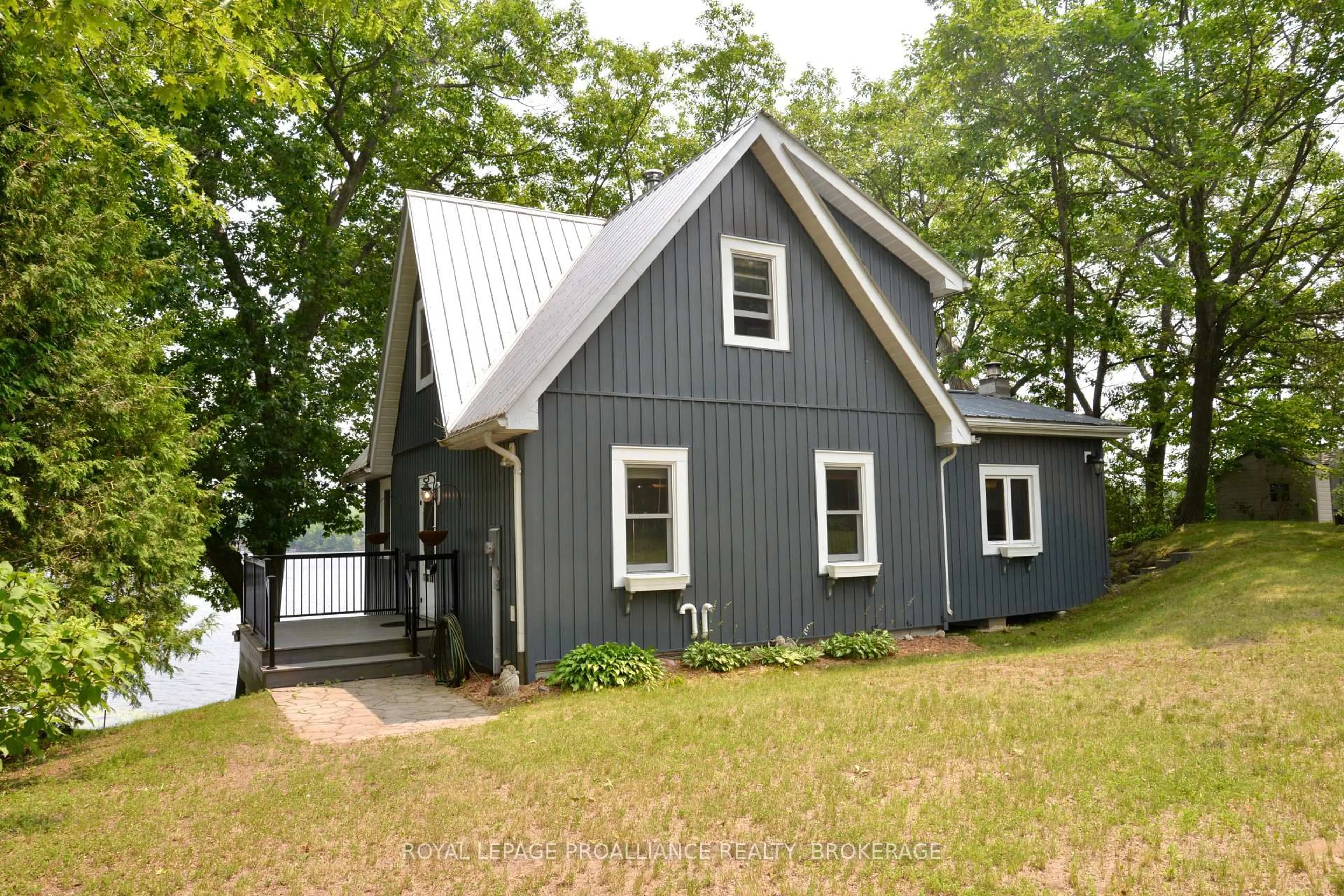 Home with vinyl exterior material, street for 6079 Carleton Dr, Verona Ontario K0H 2W0