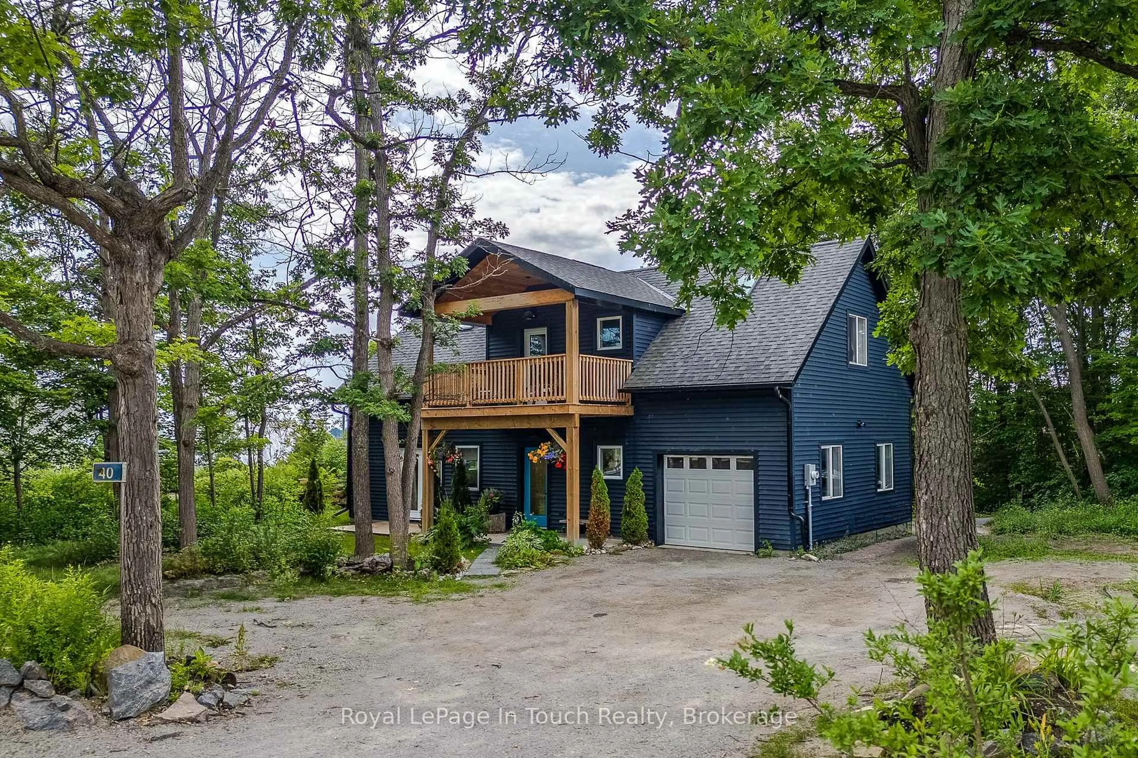 A pic from outside/outdoor area/front of a property/back of a property/a pic from drone, water/lake/river/ocean view for 40 Port Severn Rd, Georgian Bay Ontario L0K 1S0