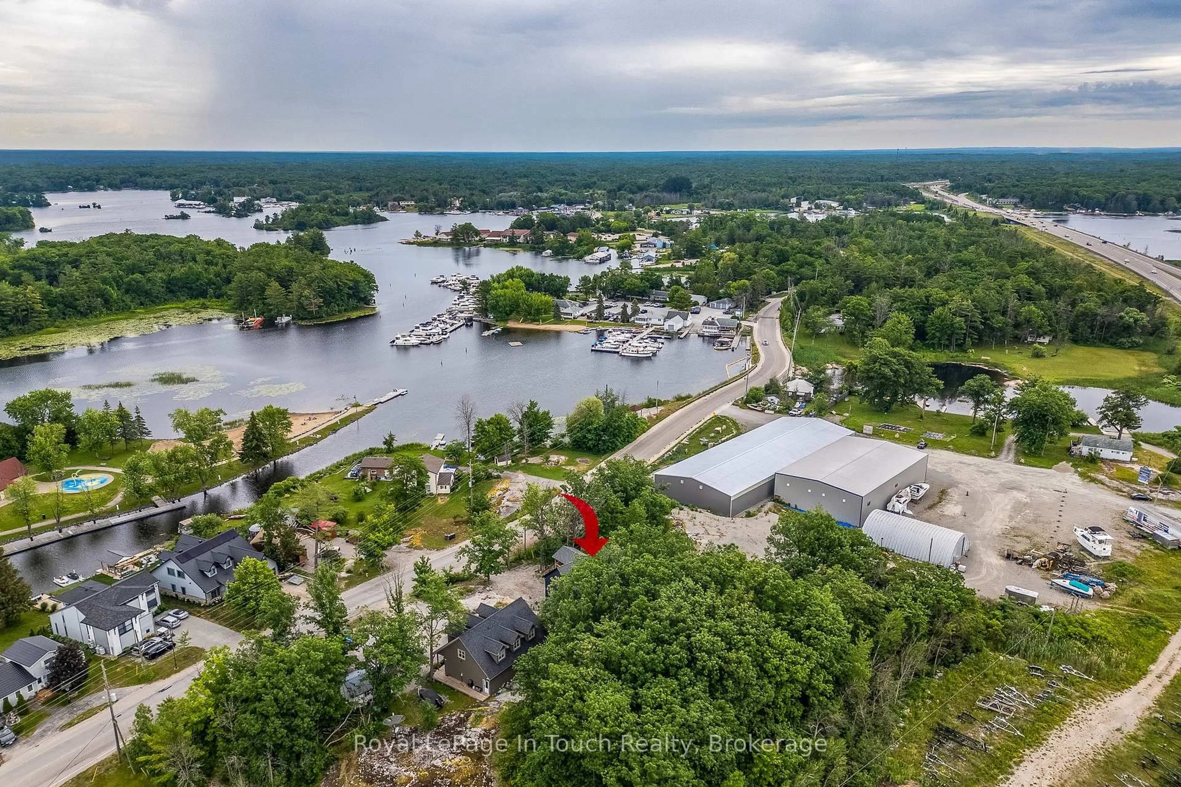 A pic from outside/outdoor area/front of a property/back of a property/a pic from drone, water/lake/river/ocean view for 40 Port Severn Rd, Georgian Bay Ontario L0K 1S0