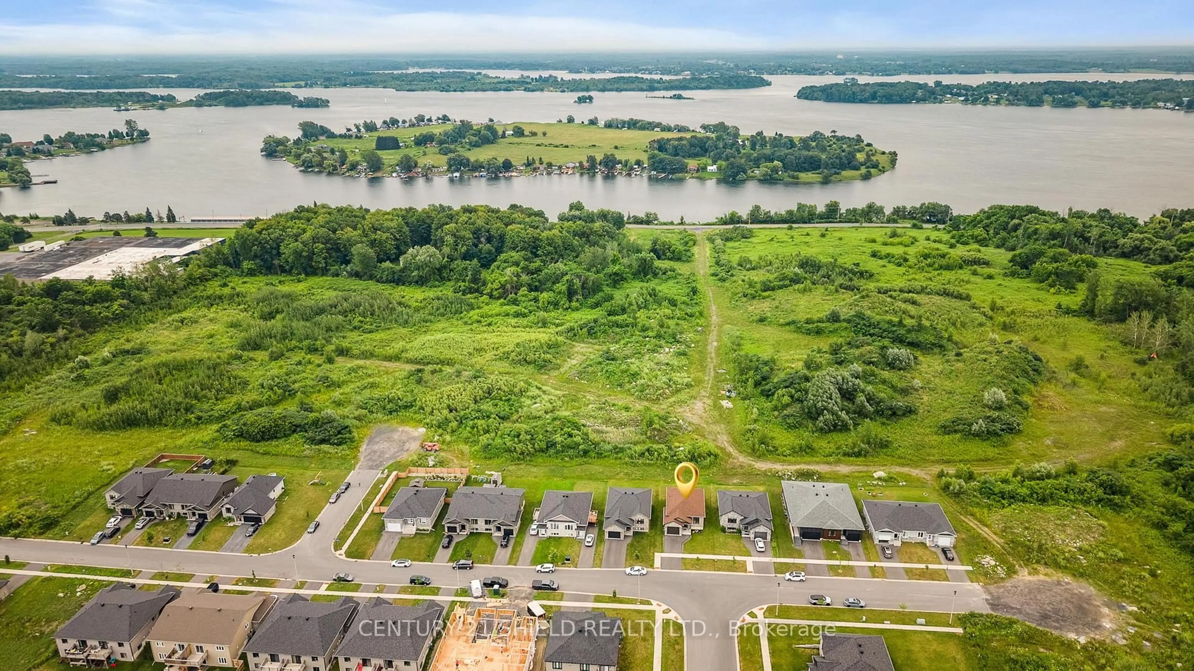 A pic from outside/outdoor area/front of a property/back of a property/a pic from drone, water/lake/river/ocean view for 2296 Crewson Crt, Cornwall Ontario K6H 0H9