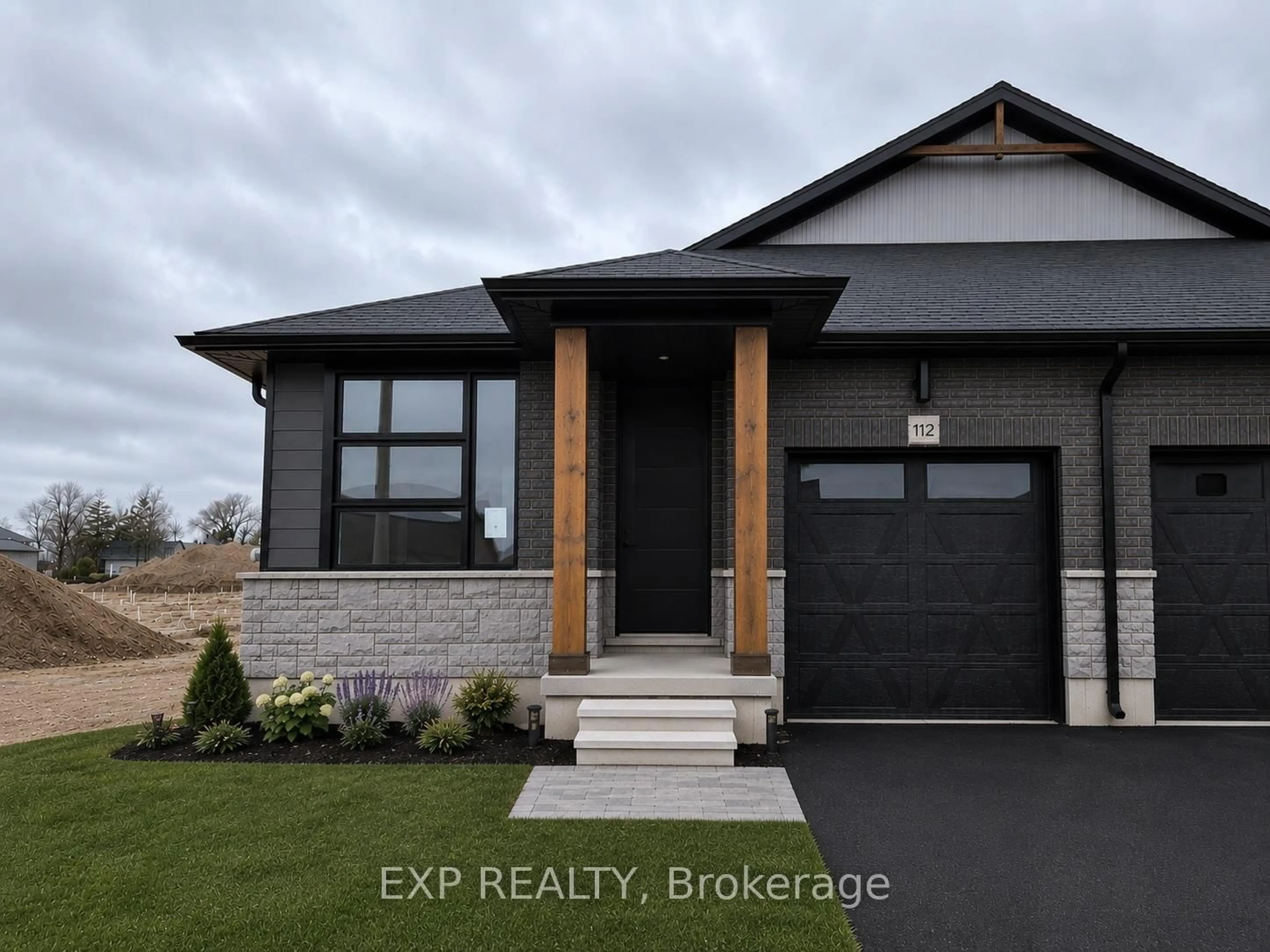 Home with brick exterior material, street for 112 THACKERAY Way, Minto Ontario N0G 1Z0