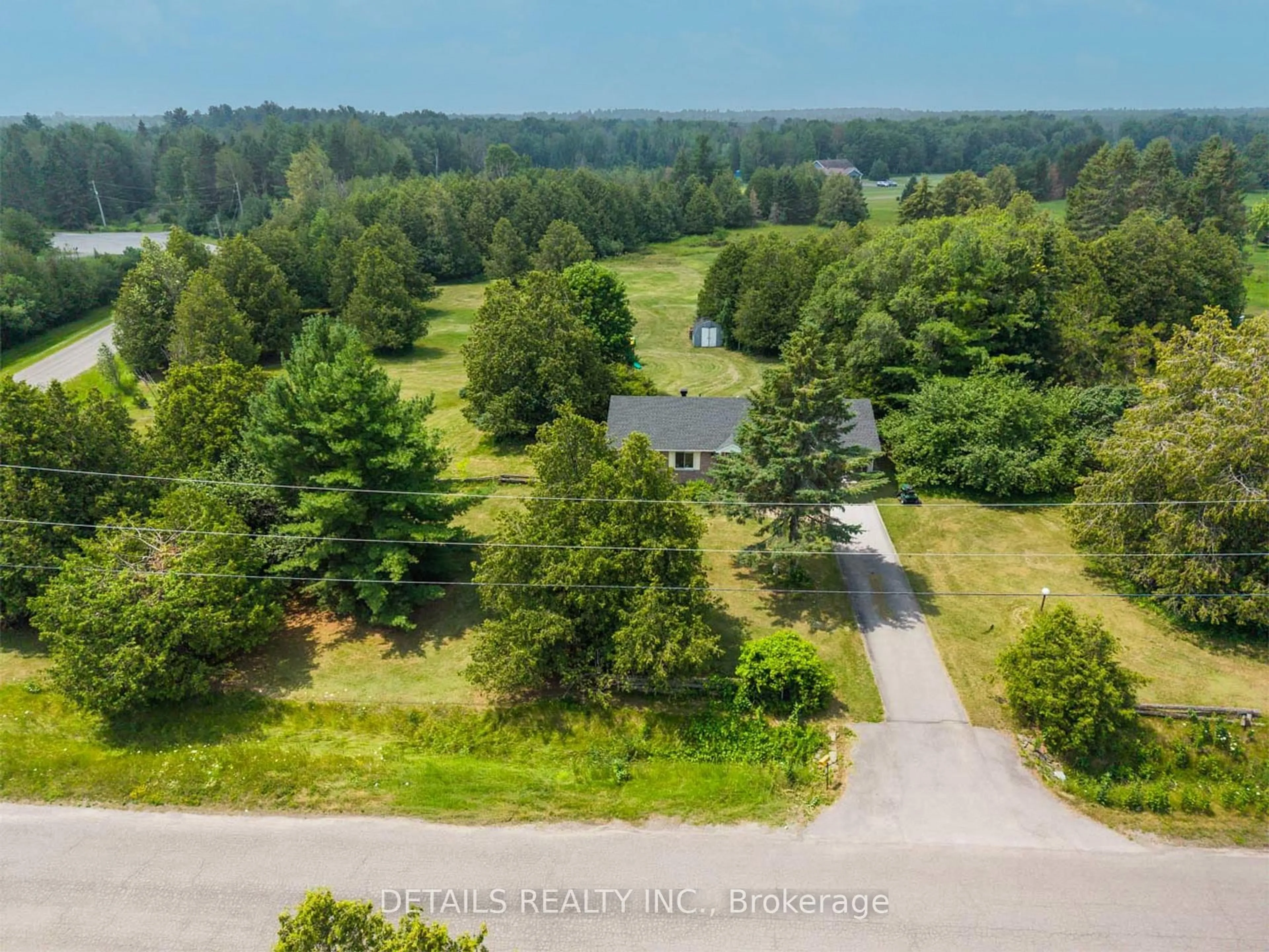 A pic from outside/outdoor area/front of a property/back of a property/a pic from drone, forest/trees view for 120 Delaney Dr, Carp Ontario K0A 1L0