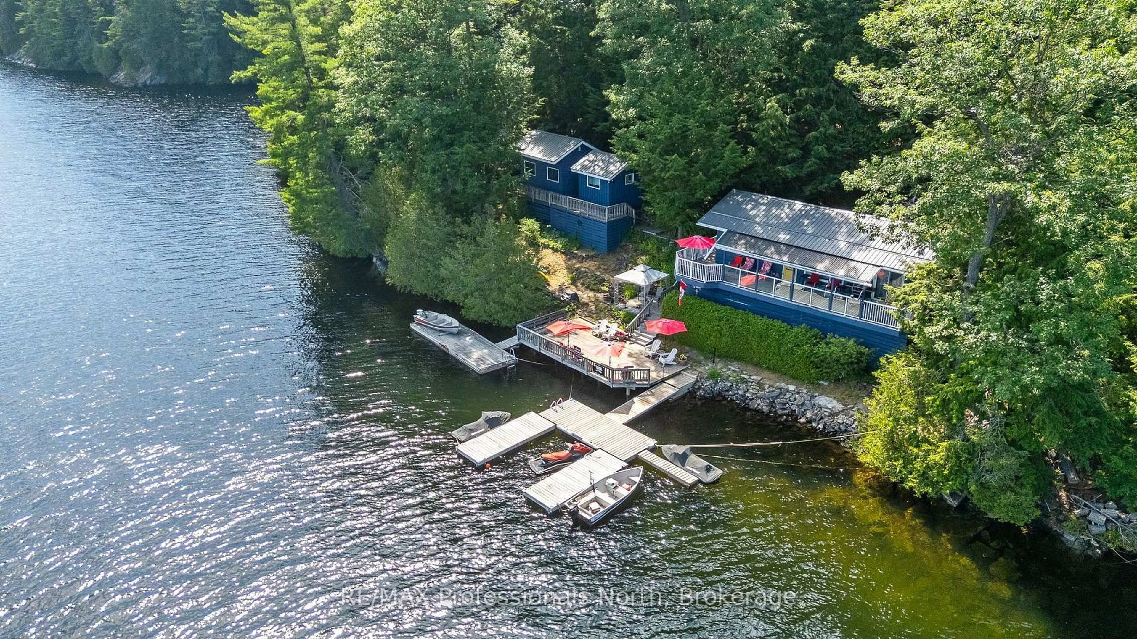 A pic from outside/outdoor area/front of a property/back of a property/a pic from drone, water/lake/river/ocean view for 11047 Little Hawk West Shore WAO, Algonquin Highlands Ontario K0M 1S0