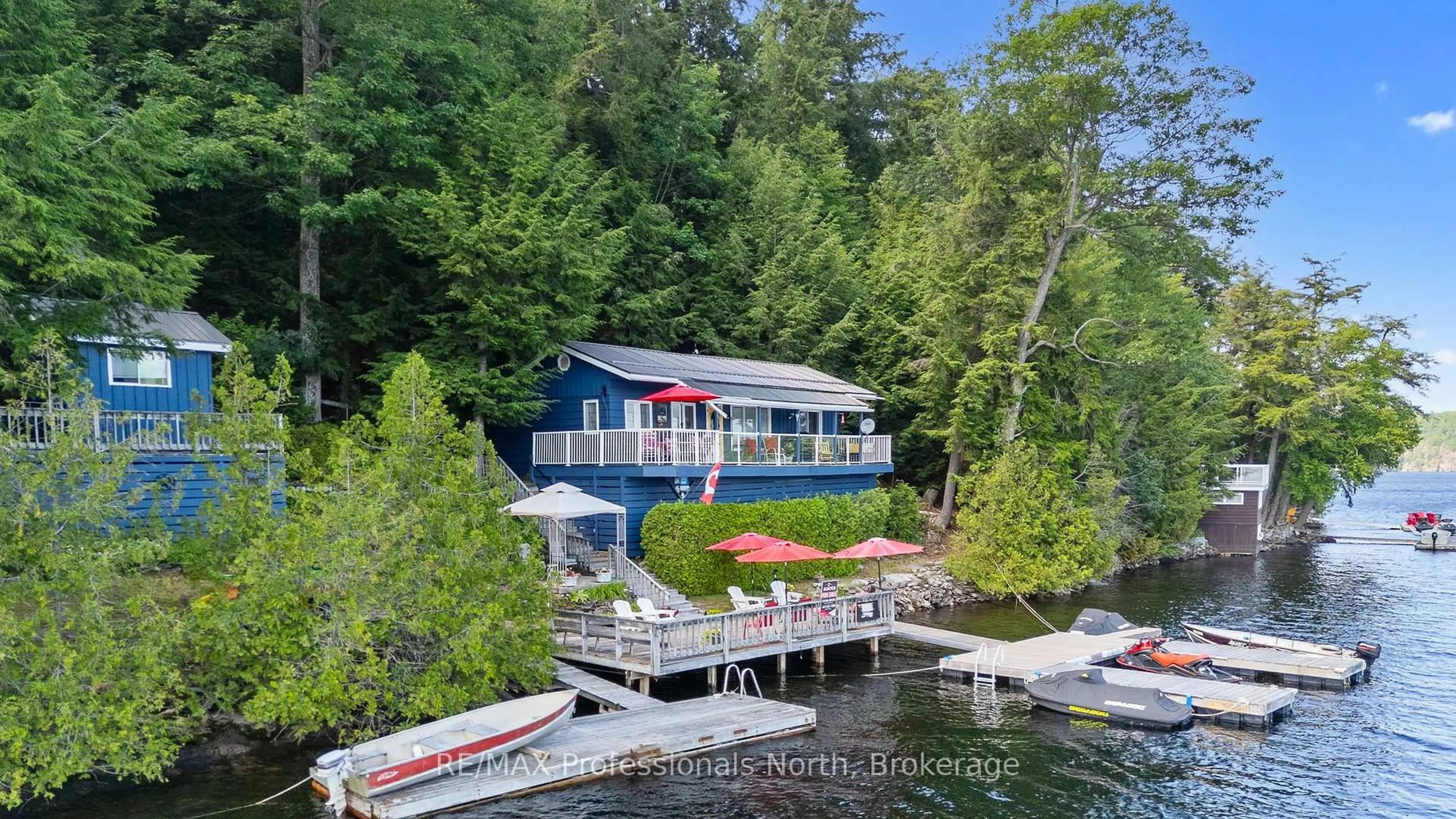 A pic from outside/outdoor area/front of a property/back of a property/a pic from drone, water/lake/river/ocean view for 11047 Little Hawk West Shore WAO, Algonquin Highlands Ontario K0M 1S0
