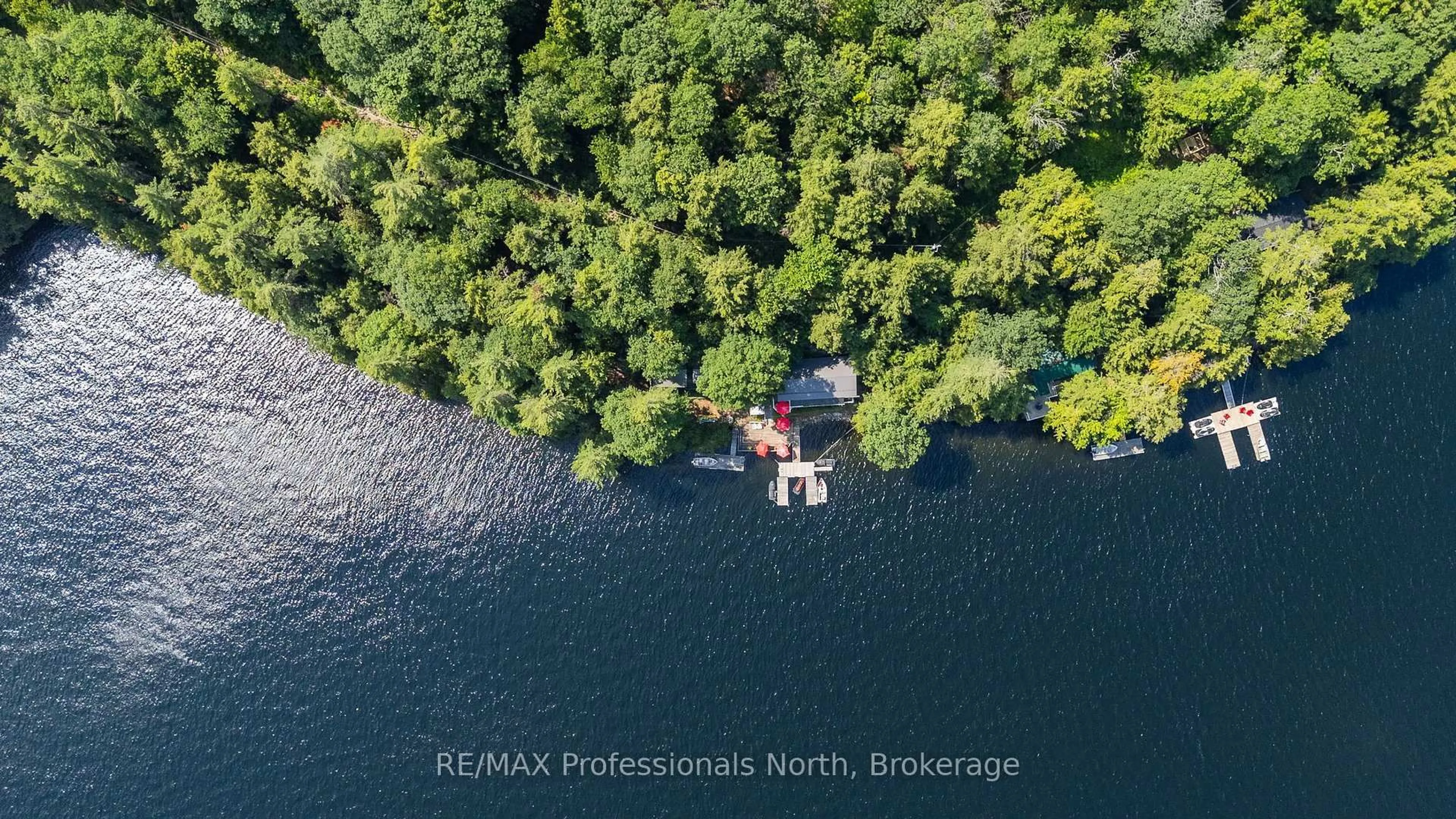 A pic from outside/outdoor area/front of a property/back of a property/a pic from drone, water/lake/river/ocean view for 11047 Little Hawk West Shore WAO, Algonquin Highlands Ontario K0M 1S0