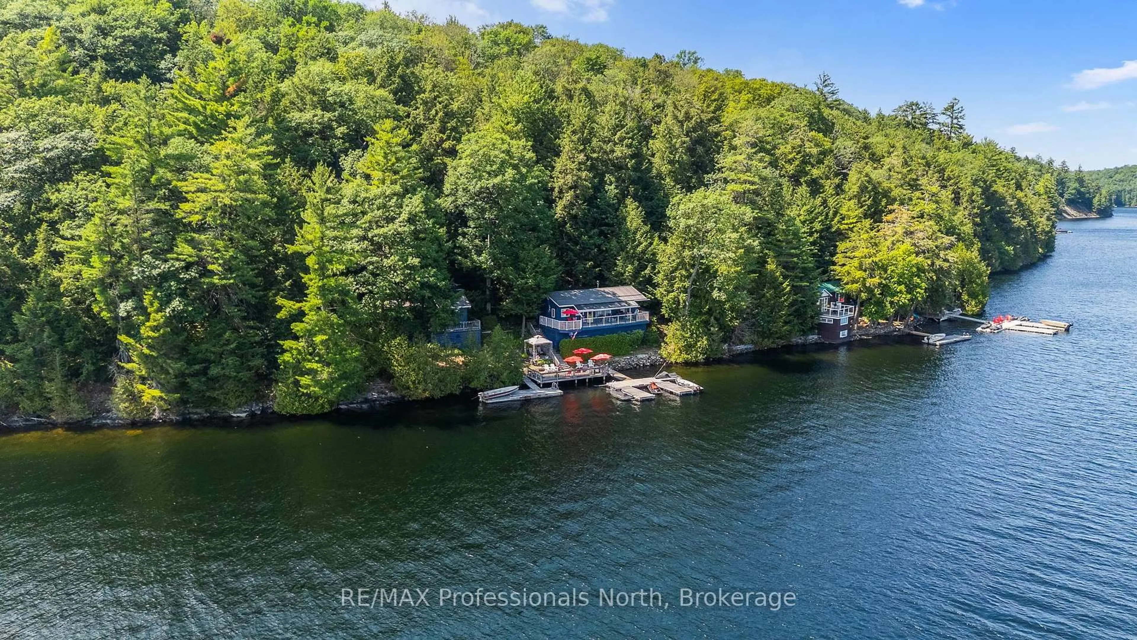 A pic from outside/outdoor area/front of a property/back of a property/a pic from drone, water/lake/river/ocean view for 11047 Little Hawk West Shore WAO, Algonquin Highlands Ontario K0M 1S0