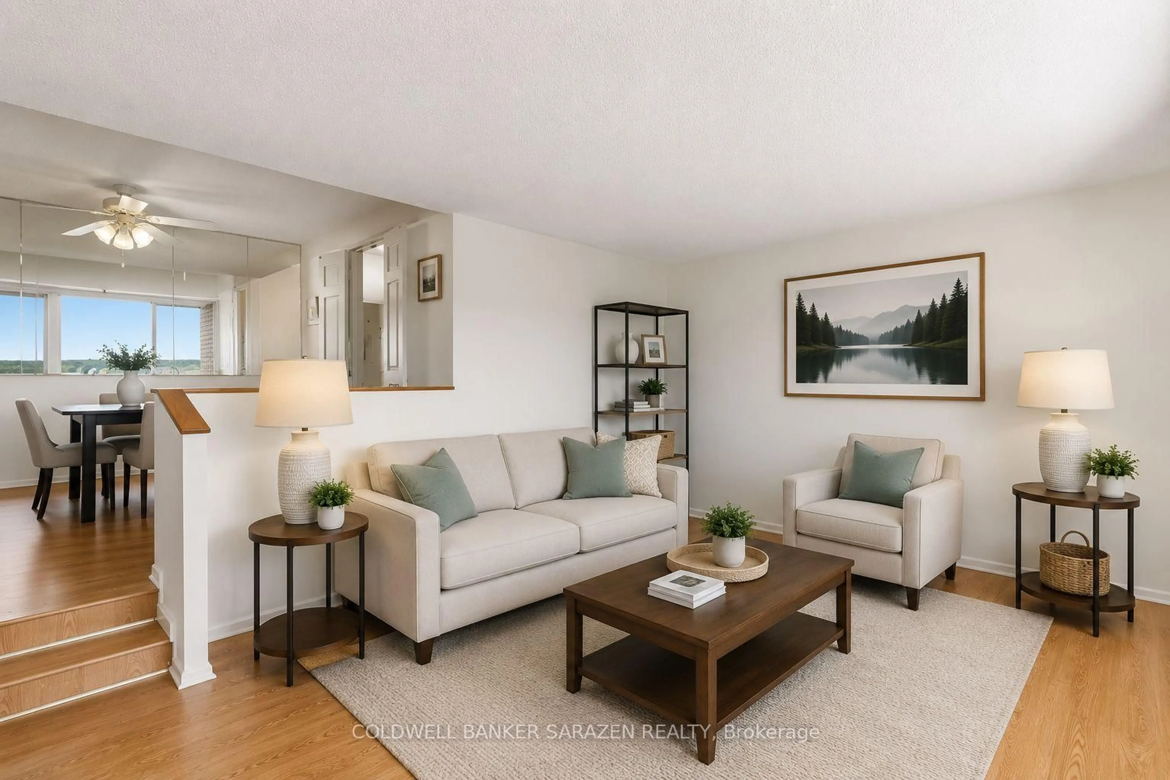 Living room with furniture, wood/laminate floor for 1100 AMBLESIDE Dr #702, Ottawa Ontario K2B 8G6