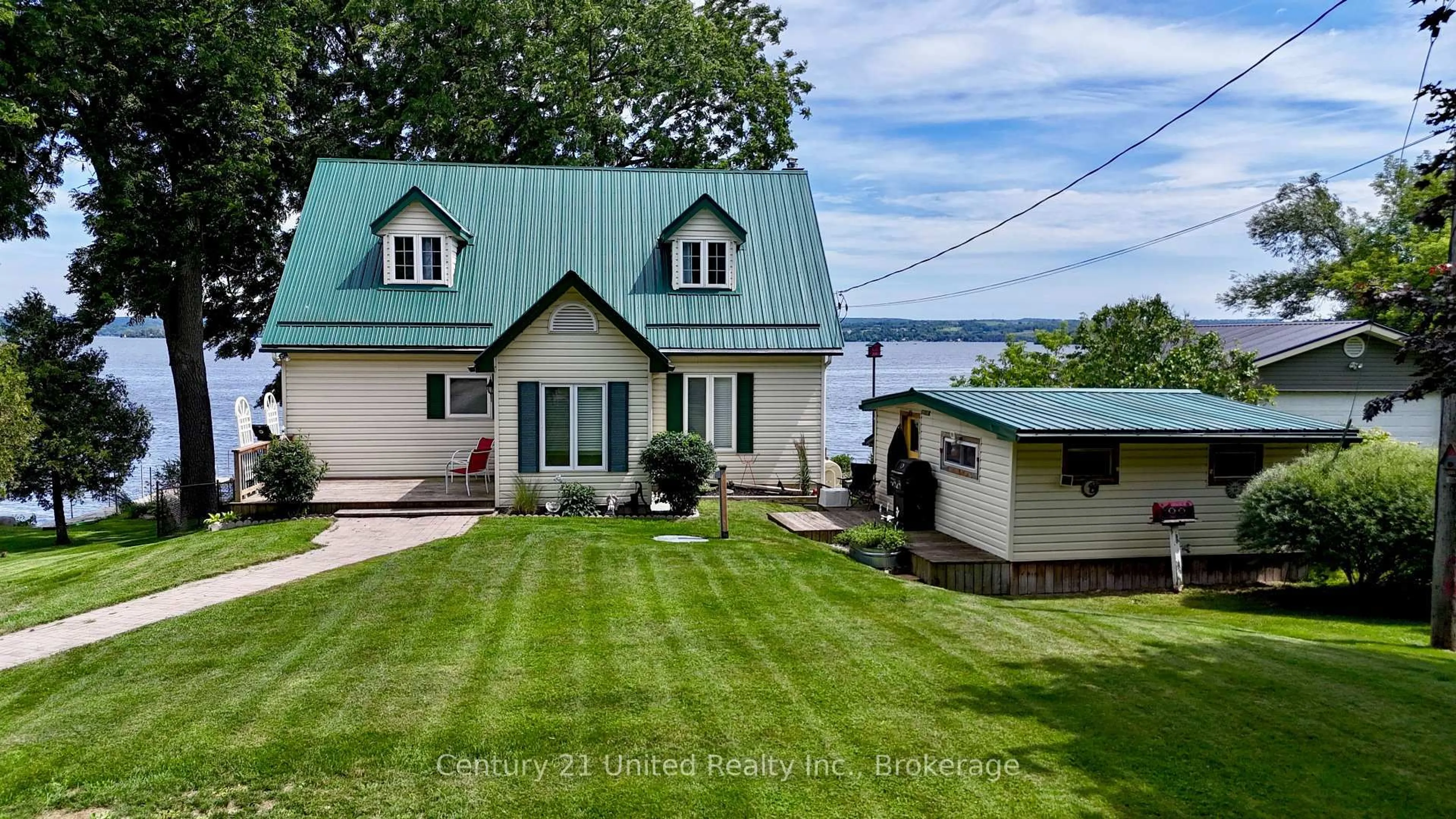 A pic from outside/outdoor area/front of a property/back of a property/a pic from drone, water/lake/river/ocean view for 40 Ivey Lane, Otonabee-South Monaghan Ontario K9J 6X8