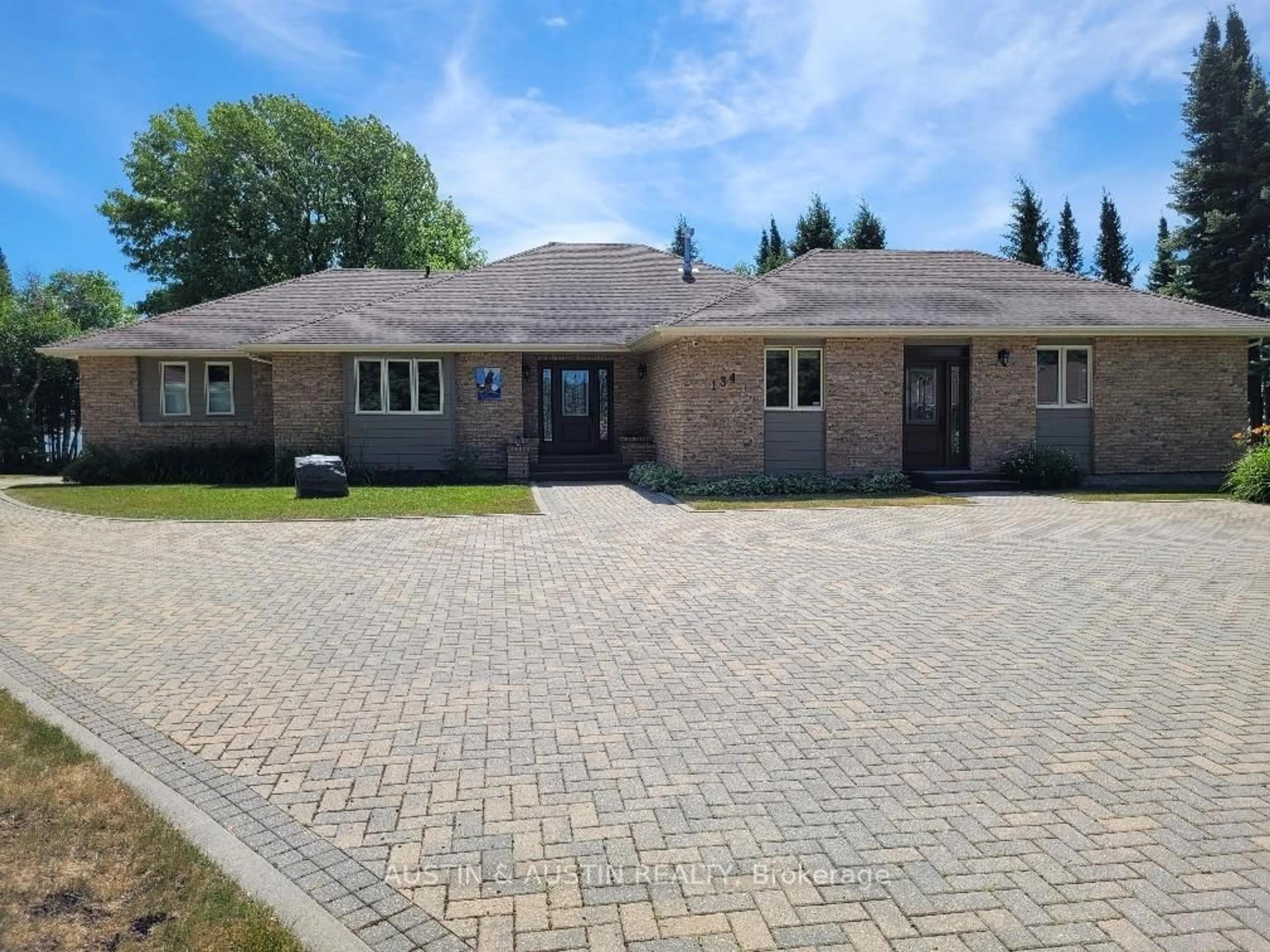 Home with brick exterior material, street for 134 Davis Point Rd, Dryden Ontario P8N 0A2