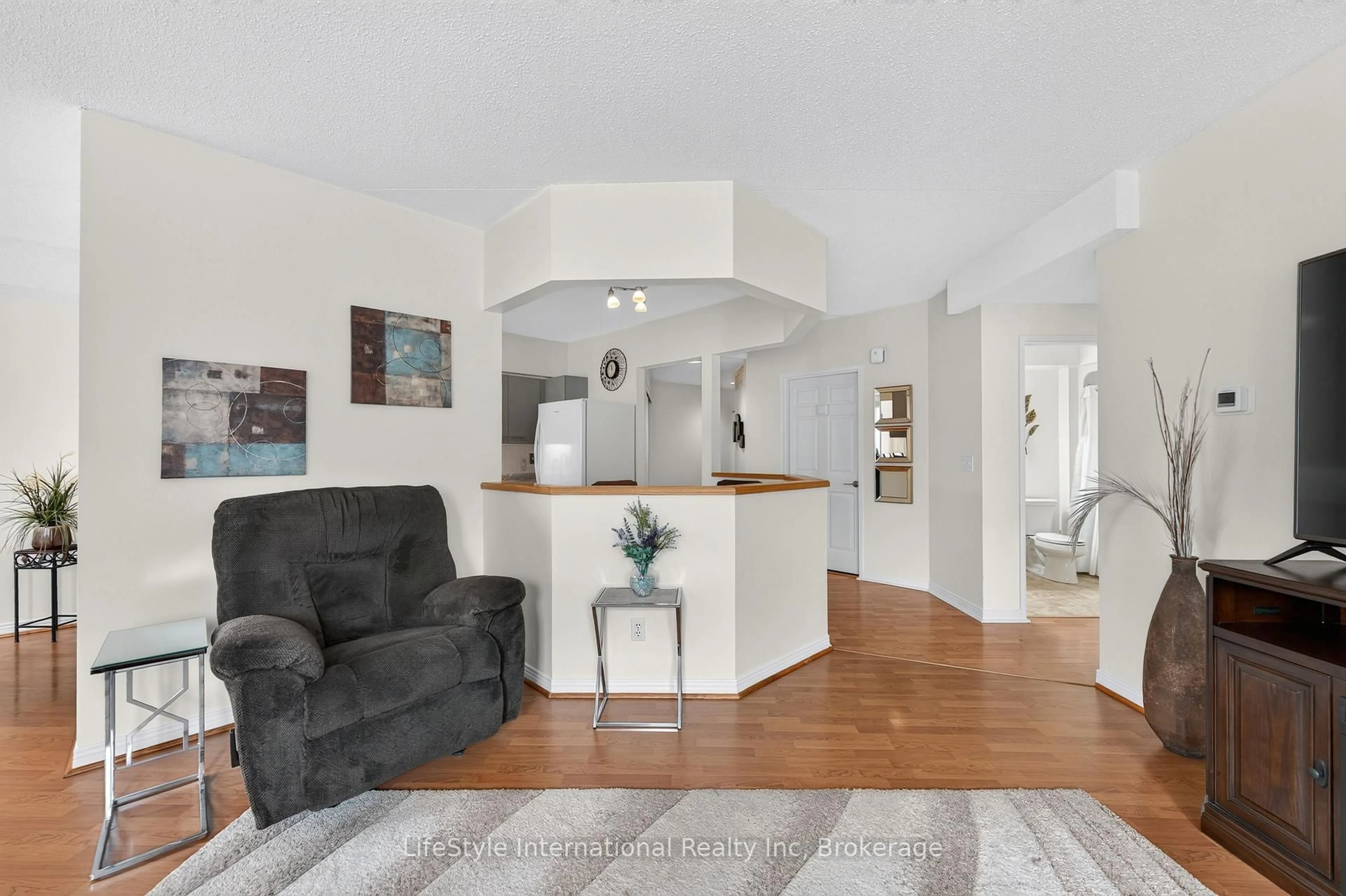 Living room with furniture, unknown for 208 Silvercreek Pkwy #210, Guelph Ontario N1H 8H2