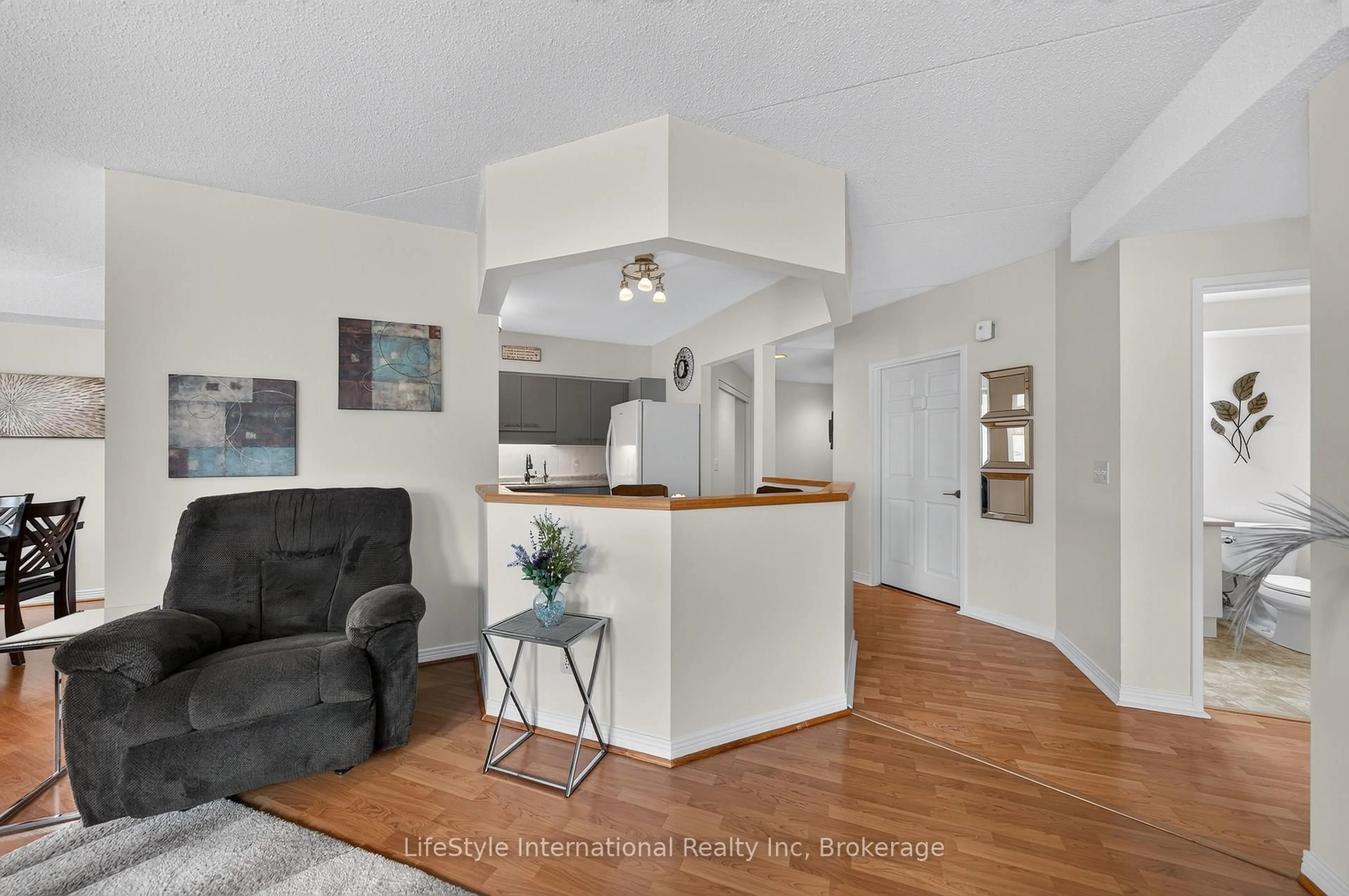 Living room with furniture, unknown for 208 Silvercreek Pkwy #210, Guelph Ontario N1H 8H2