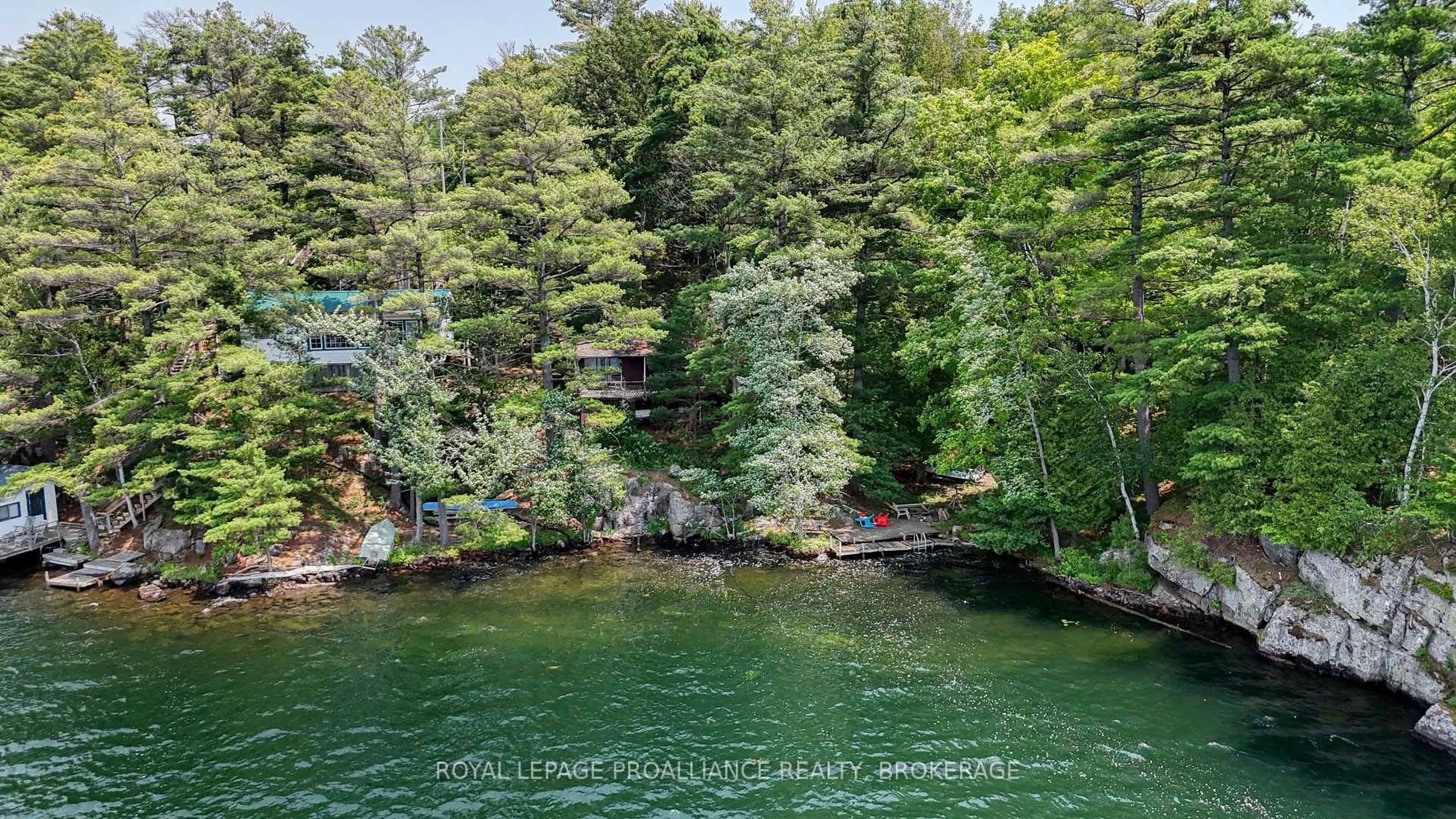 A pic from outside/outdoor area/front of a property/back of a property/a pic from drone, water/lake/river/ocean view for 1135 Twin Island Lane, Perth Road Ontario K0H 2L0