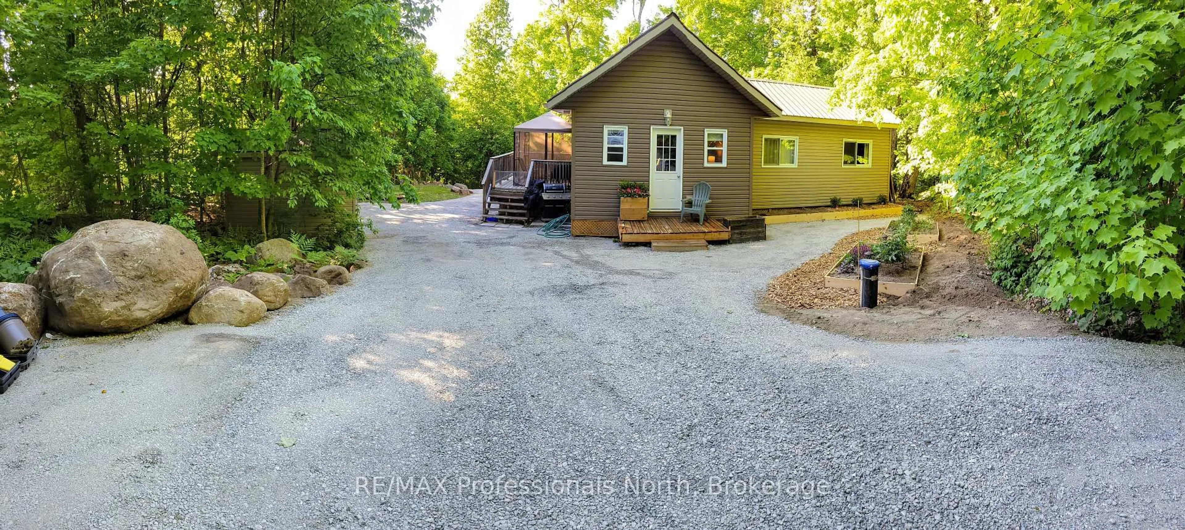A pic from outside/outdoor area/front of a property/back of a property/a pic from drone, street for 1145 Chelsea Lane, Algonquin Highlands Ontario K0M 1J1