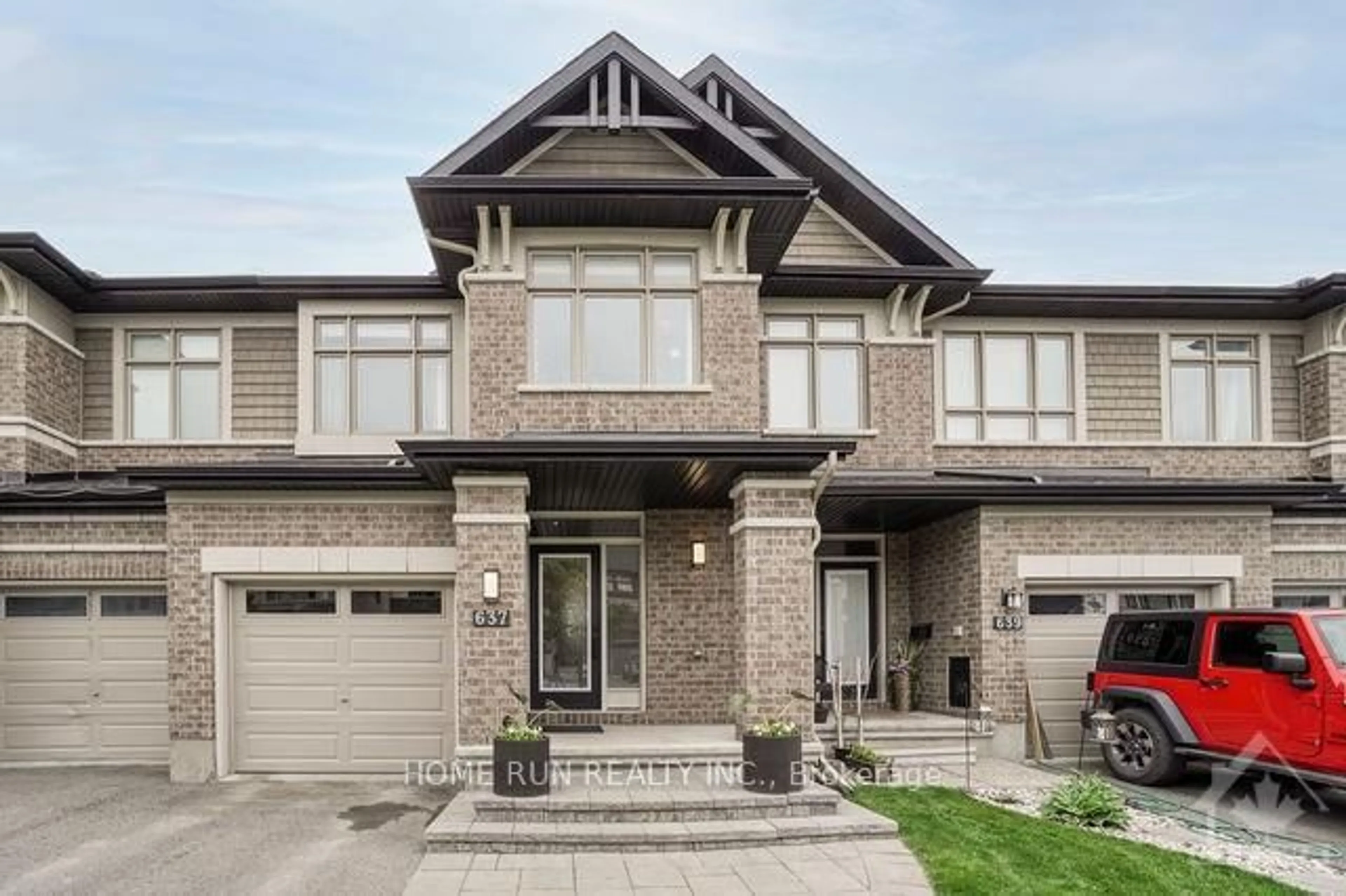 Home with brick exterior material, street for 637 Tennant Way, Ottawa Ontario K4M 0C7