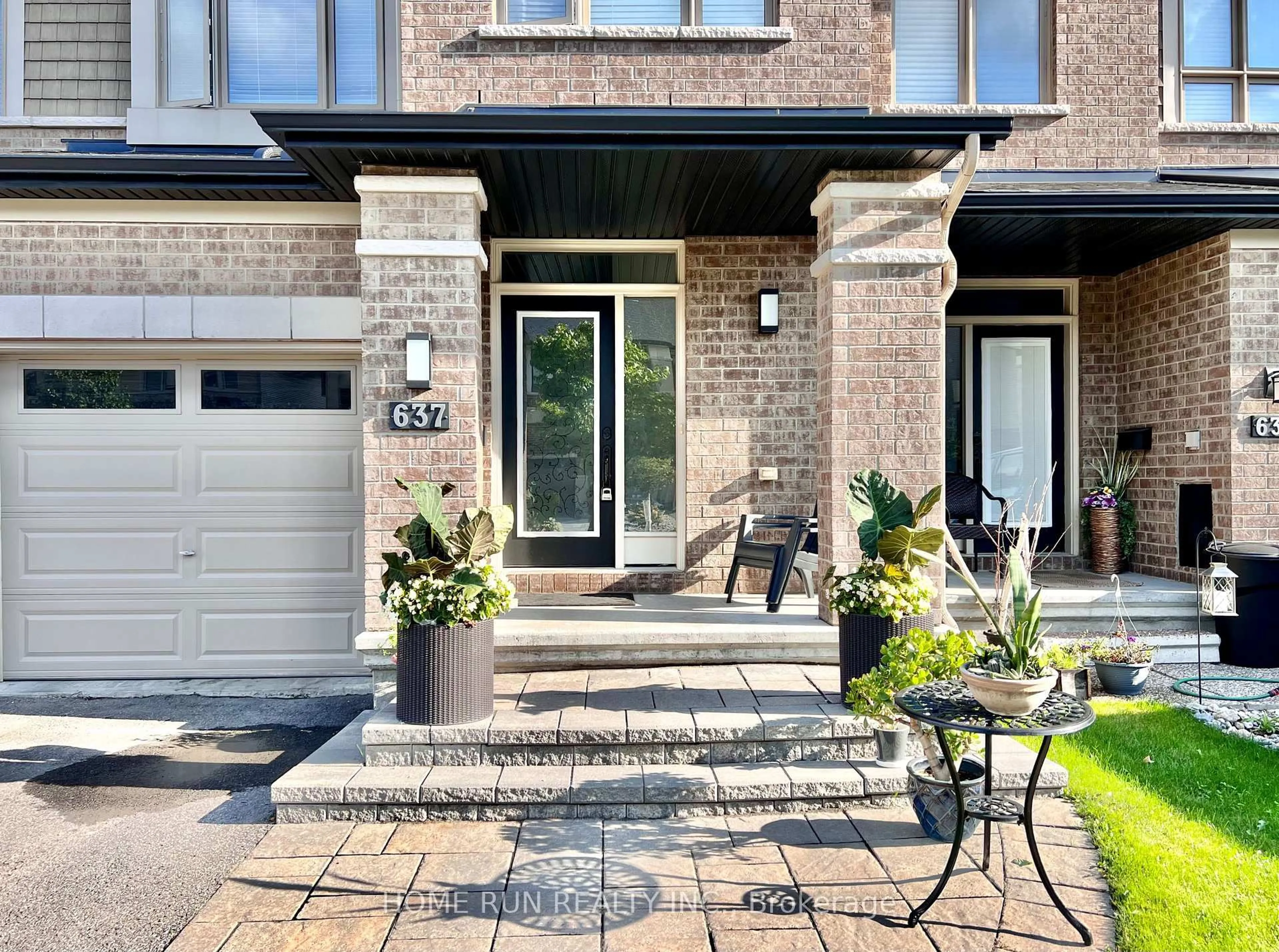 Home with brick exterior material, street for 637 Tennant Way, Ottawa Ontario K4M 0C7