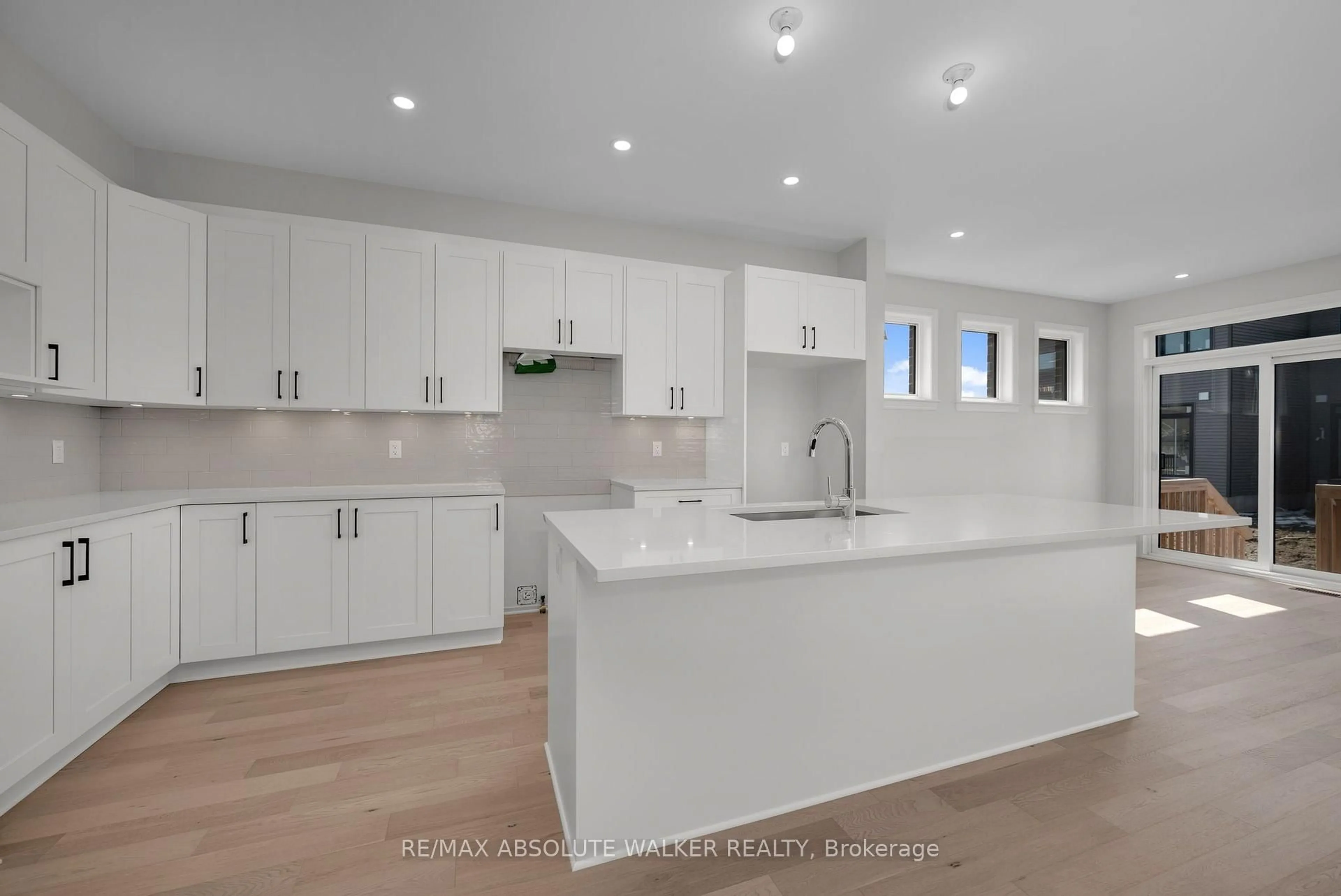 Open concept kitchen, ceramic/tile floor for 181 Kerala Pl, Ottawa Ontario K1T 0Z3