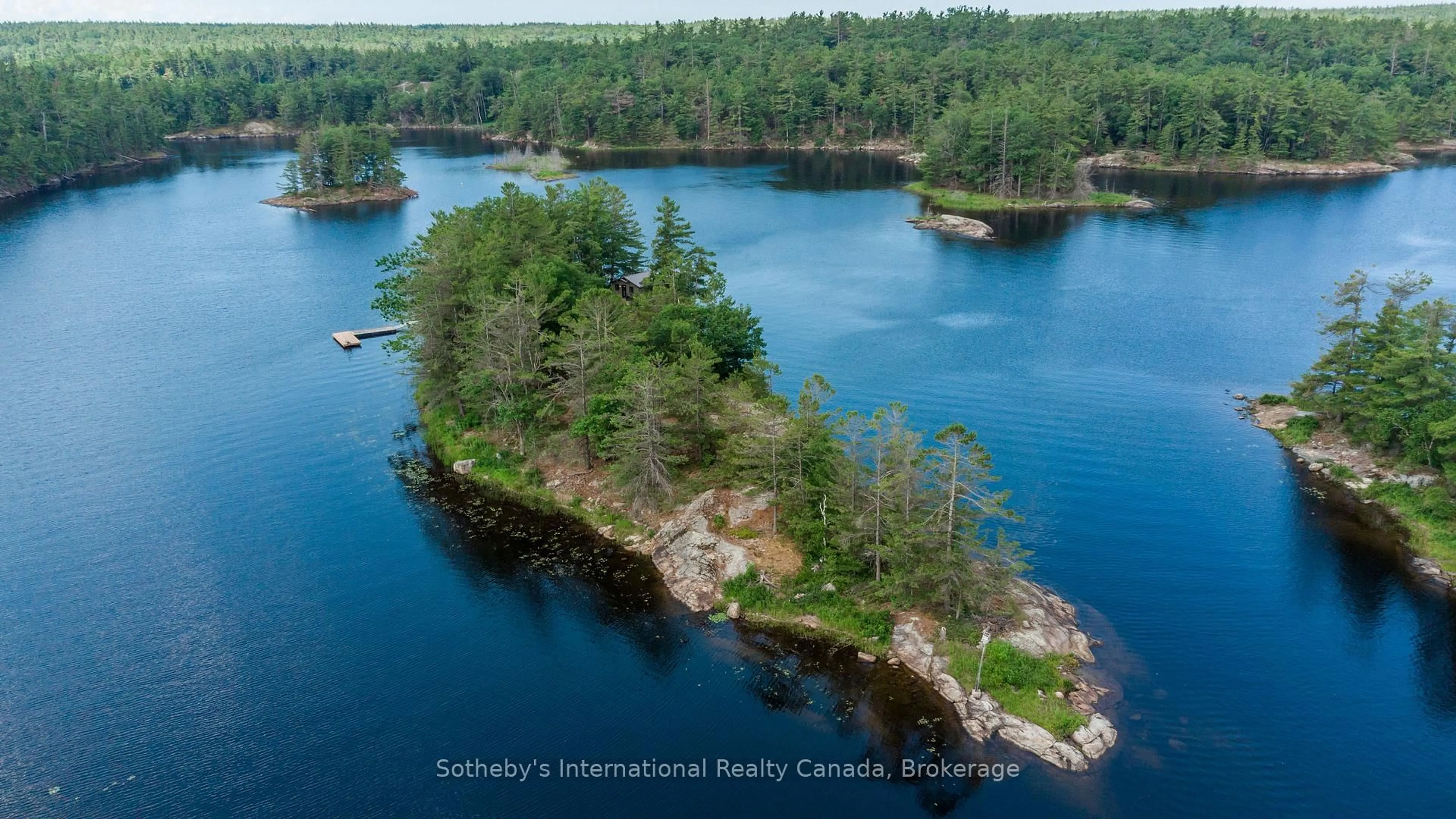 A pic from outside/outdoor area/front of a property/back of a property/a pic from drone, water/lake/river/ocean view for 1 B277 Island, The Archipelago Ontario P0C 1H0