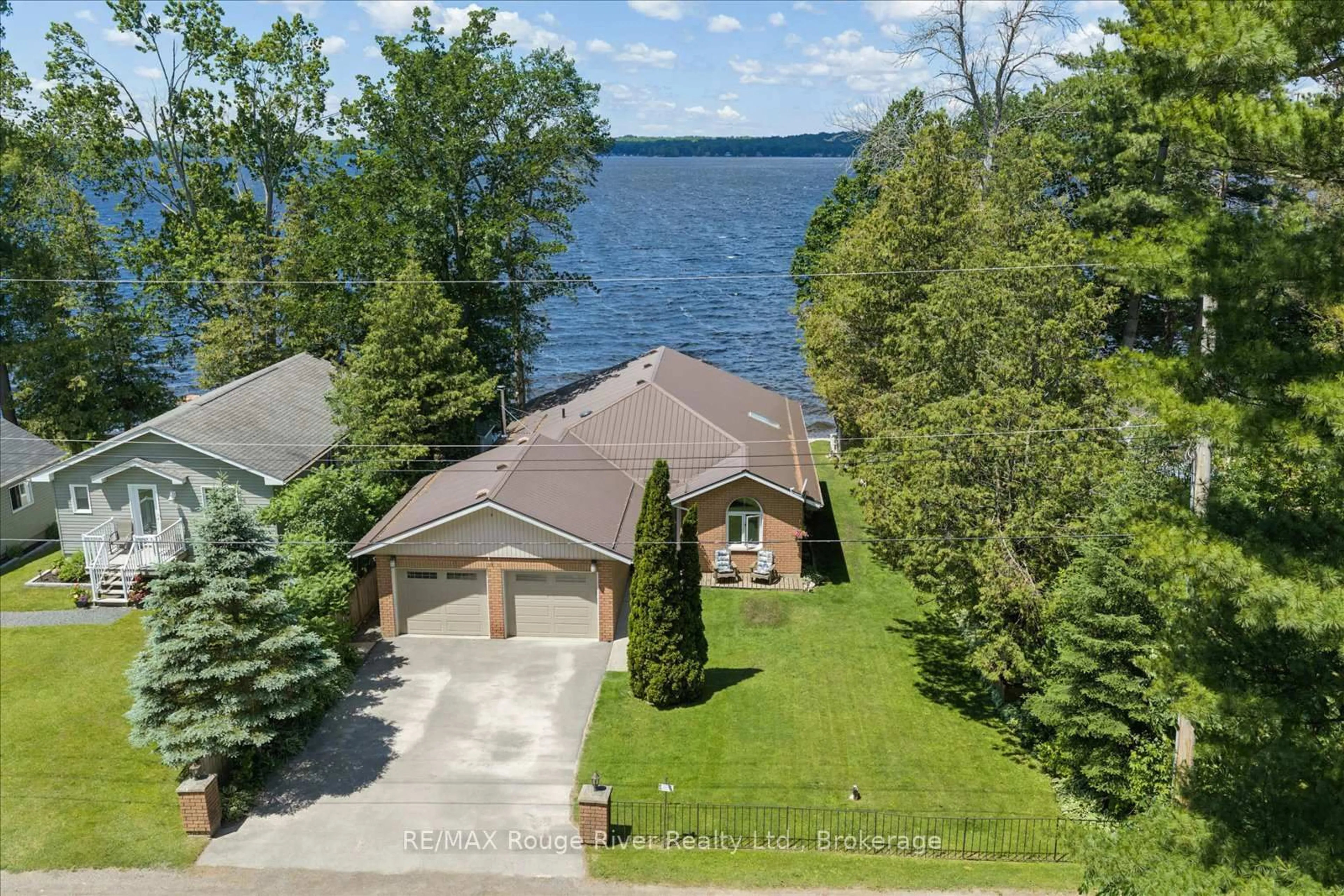 A pic from outside/outdoor area/front of a property/back of a property/a pic from drone, water/lake/river/ocean view for 66 Tipperary Rd, Limoges Ontario K0K 2M0