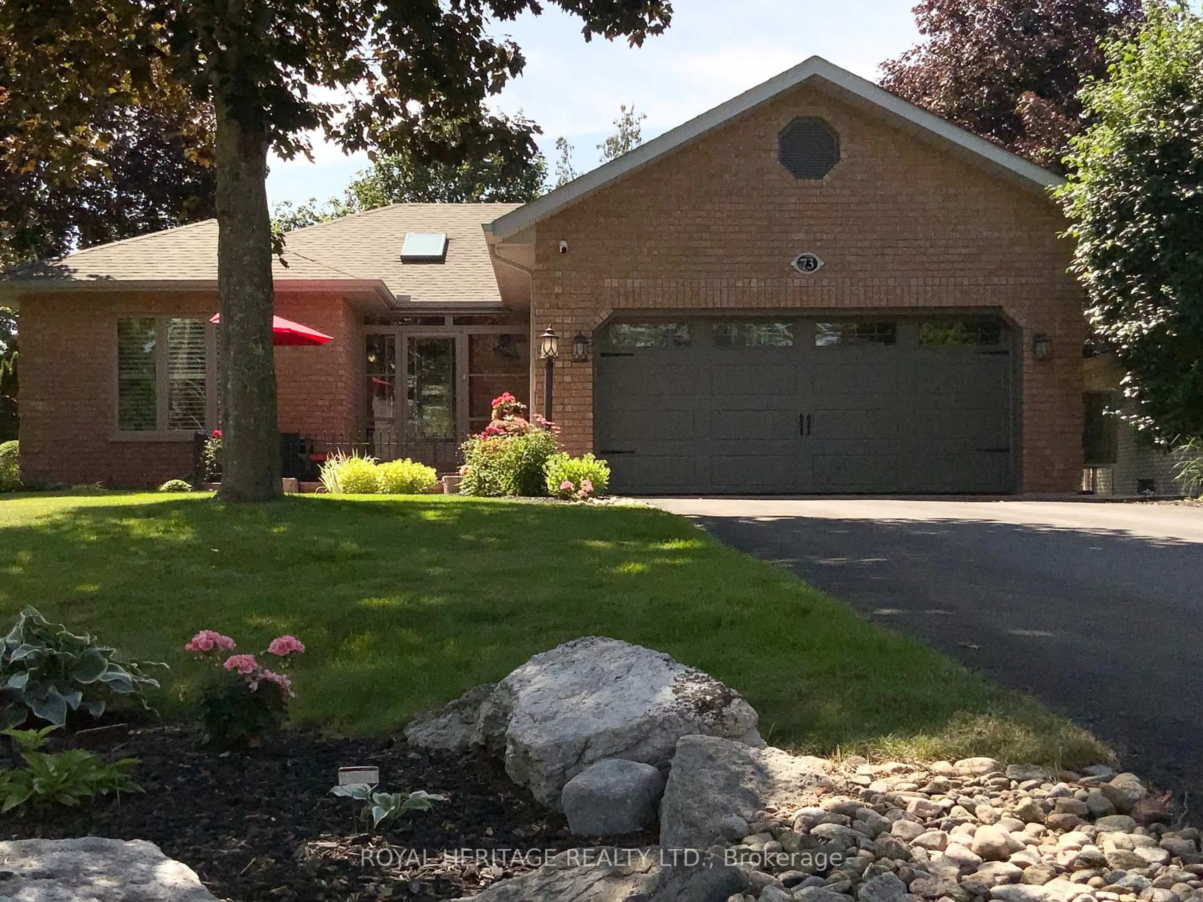 Home with brick exterior material, street for 73 Navigators Tr, Kawartha Lakes Ontario K0M 1A0