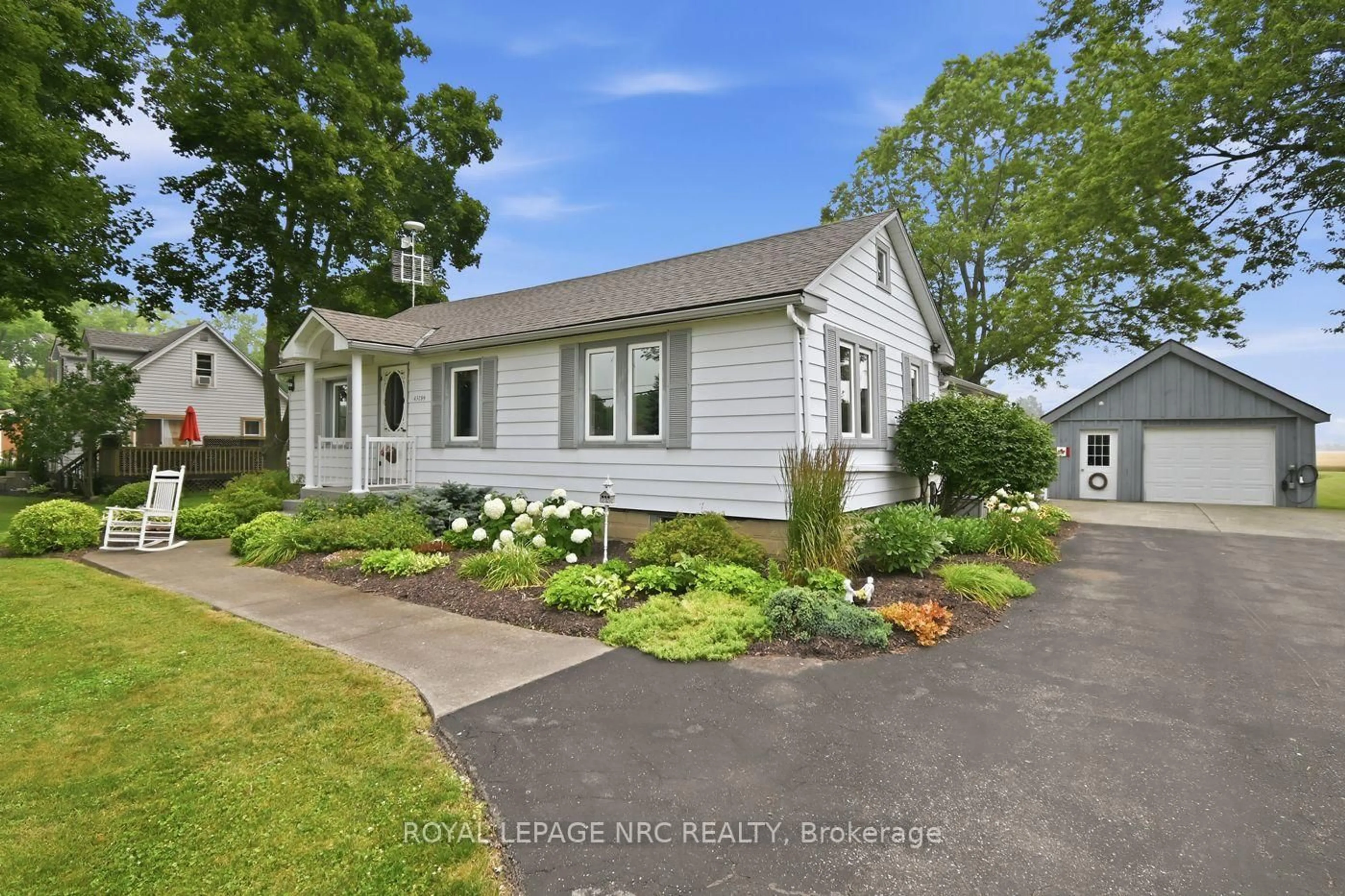 Home with vinyl exterior material, street for 43289 Pettit Rd, Wainfleet Ontario L0S 1V0