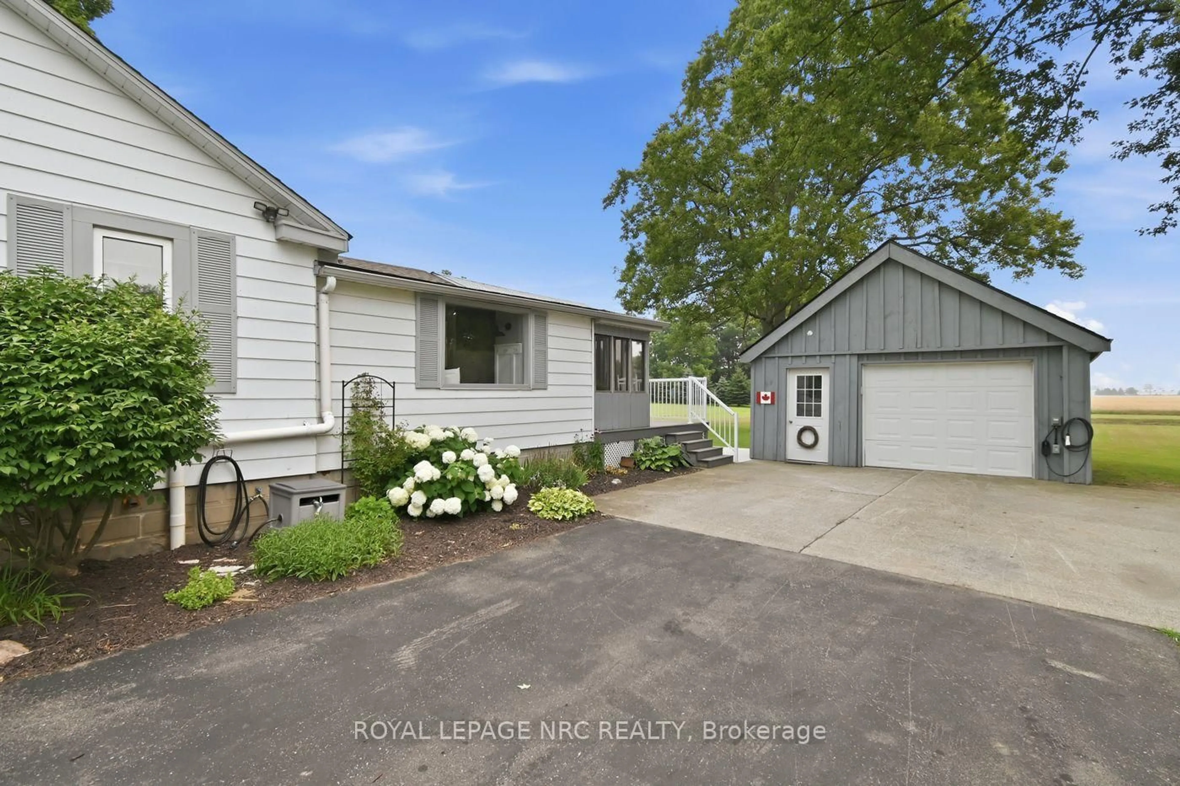 A pic from outside/outdoor area/front of a property/back of a property/a pic from drone, street for 43289 Pettit Rd, Wainfleet Ontario L0S 1V0