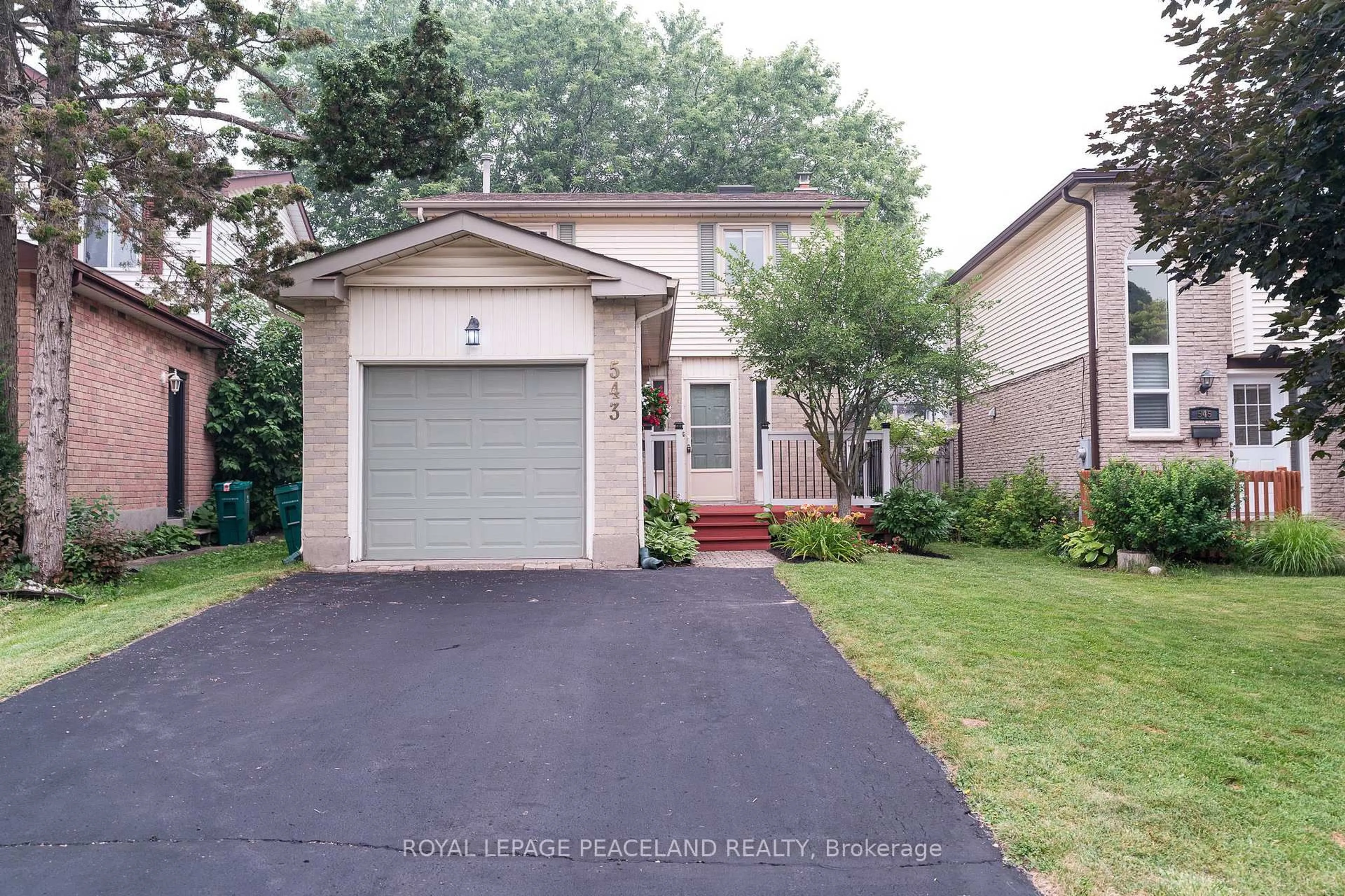 Home with brick exterior material, street for 543 Drummerhill Cres, Waterloo Ontario N2T 1G3