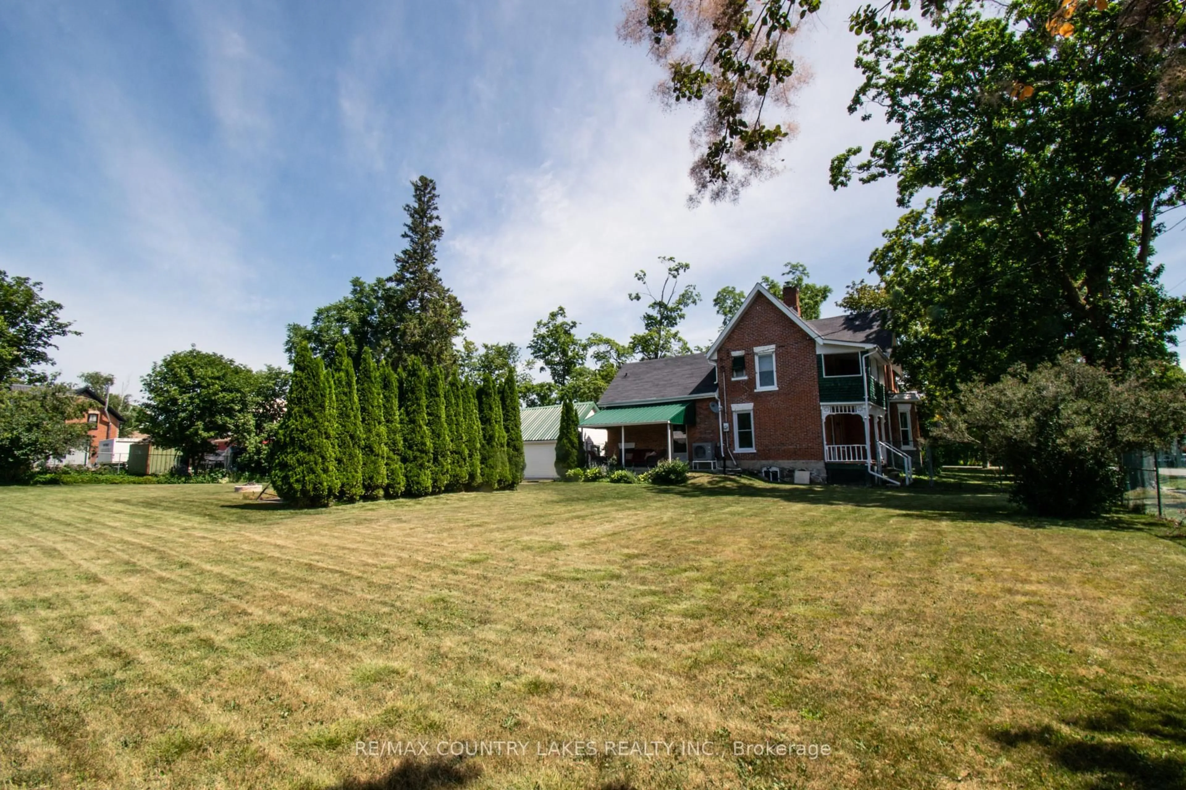 A pic from outside/outdoor area/front of a property/back of a property/a pic from drone, unknown for 100 Nappadale St, Kawartha Lakes Ontario K0M 2T0
