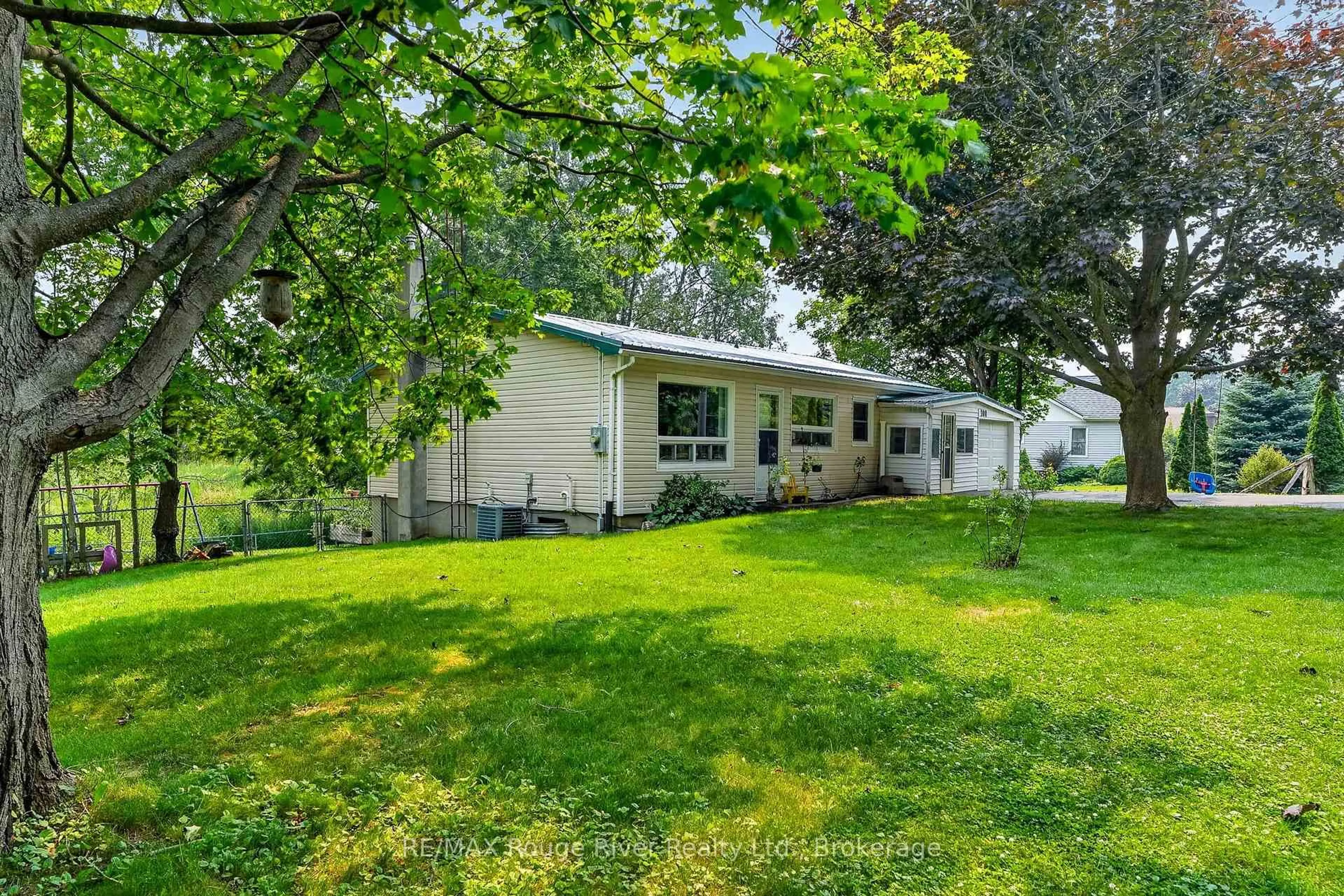 Home with vinyl exterior material, street for 100 king St, Cramahe Ontario K0K 1S0