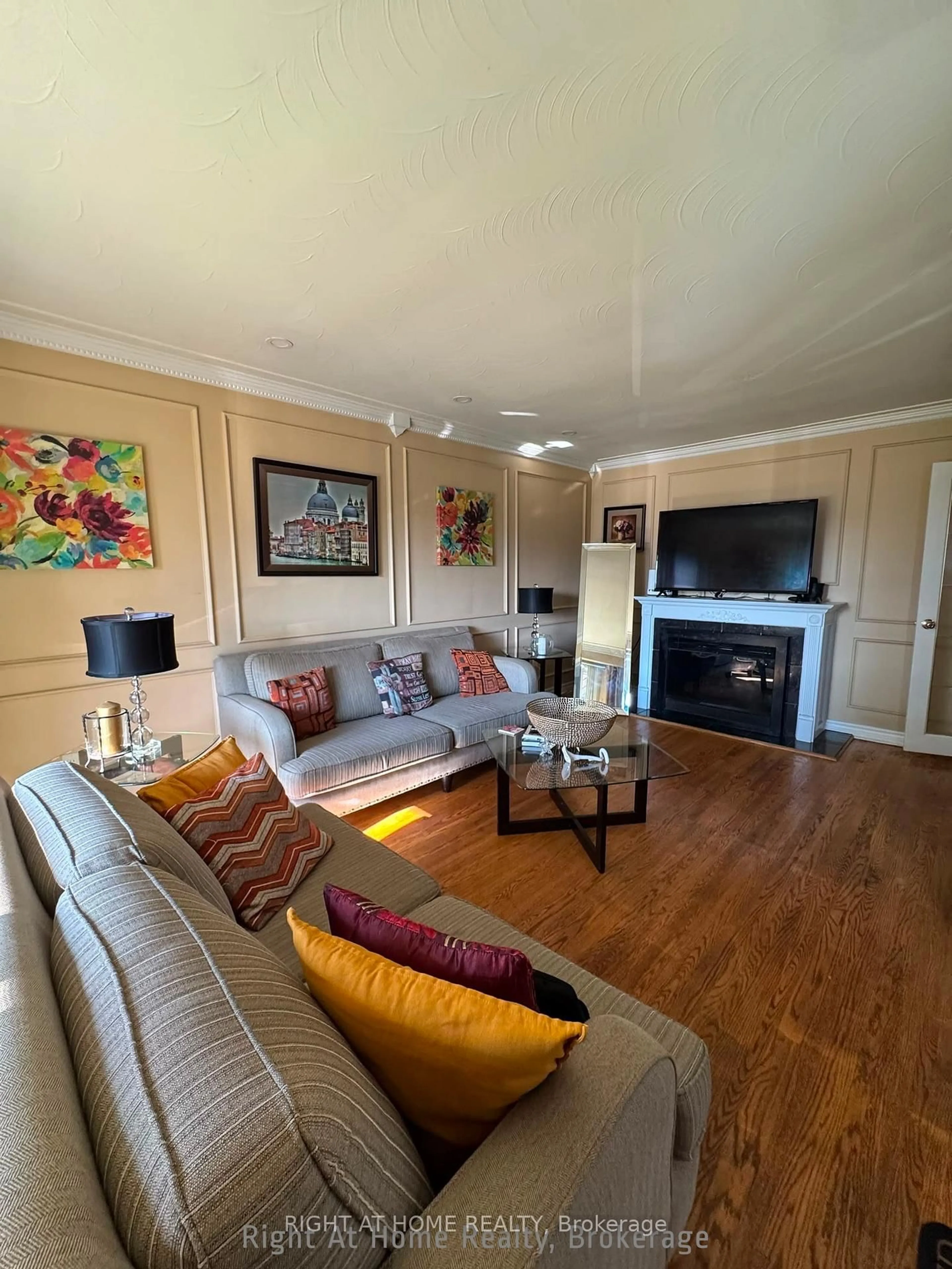 Living room with furniture, wood/laminate floor for 816 Dunn Ave, Hamilton Ontario L8H 6N2