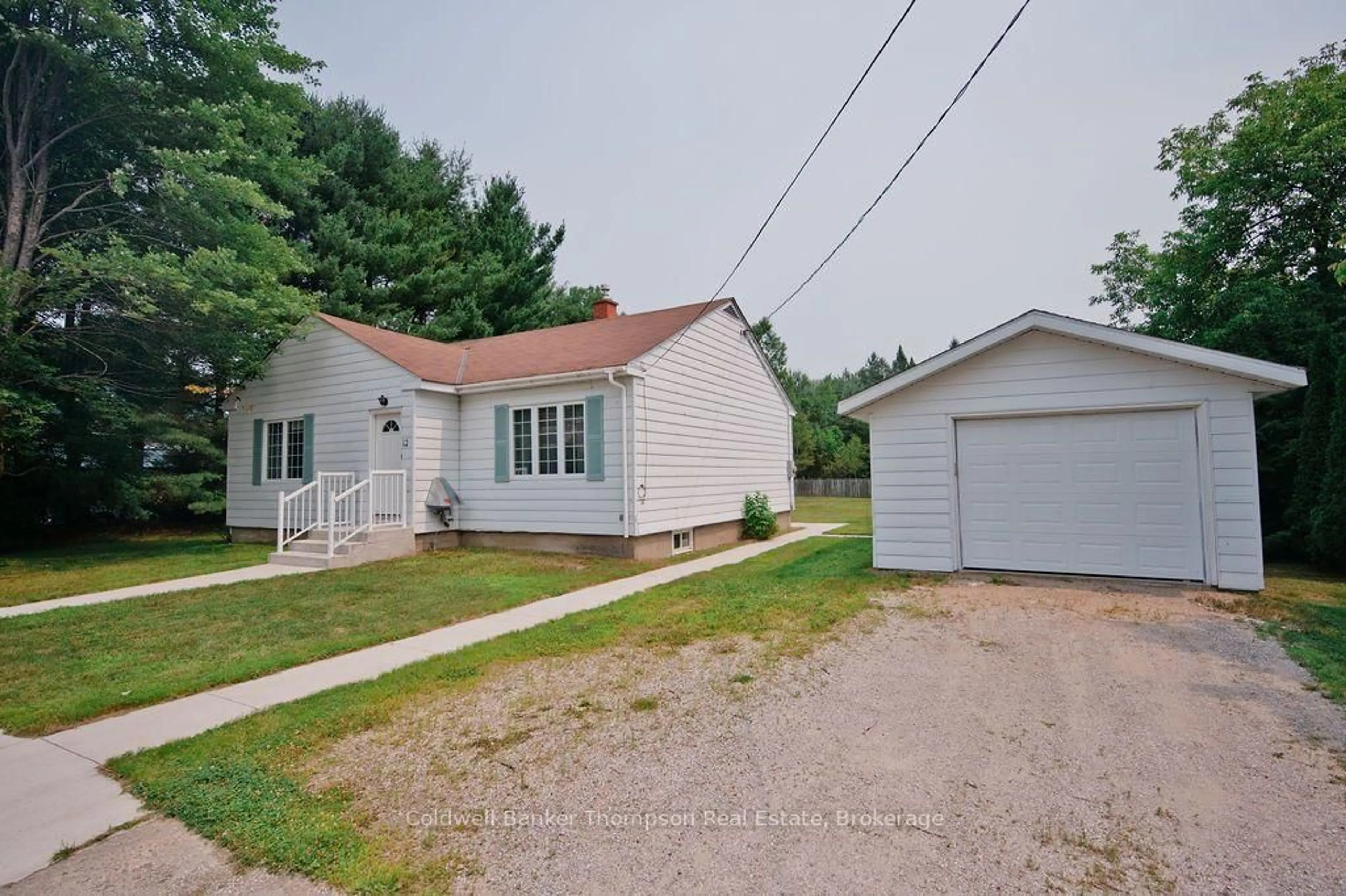 A pic from outside/outdoor area/front of a property/back of a property/a pic from drone, street for 12 Connolly St, South River Ontario P0A 1X0