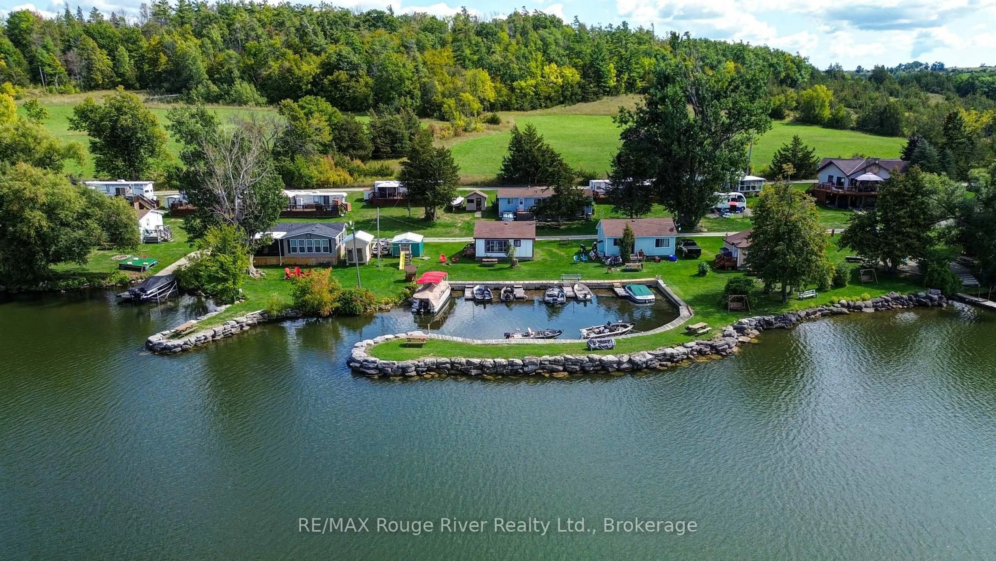 A pic from outside/outdoor area/front of a property/back of a property/a pic from drone, water/lake/river/ocean view for 68 Robins Rd #198, Alnwick/Haldimand Ontario K0K 2X0
