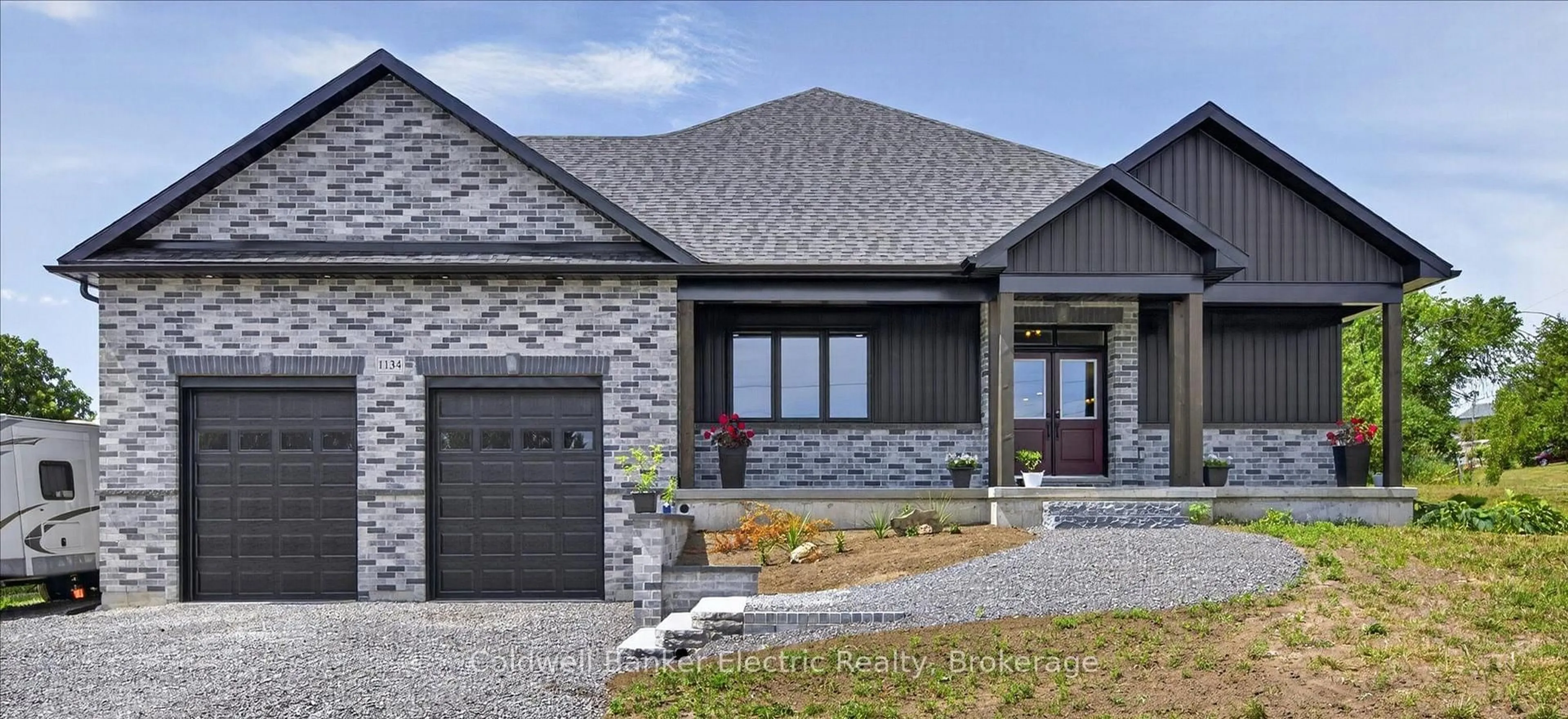 Home with brick exterior material, street for 1134 River Rd, Asphodel-Norwood Ontario K0L 1Y0