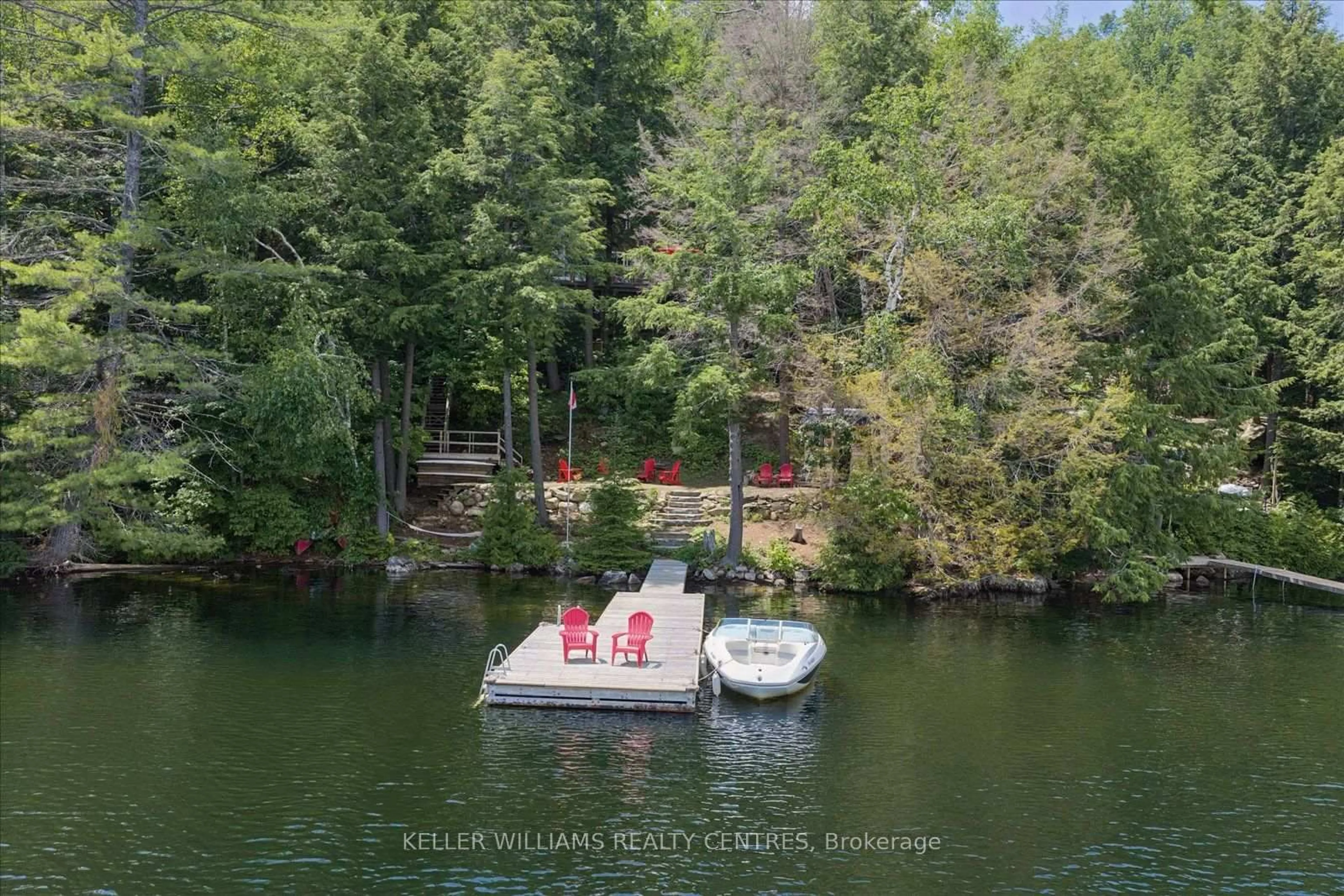 A pic from outside/outdoor area/front of a property/back of a property/a pic from drone, water/lake/river/ocean view for 1242 Cadillac Tr, Dysart et al Ontario K0L 1X0