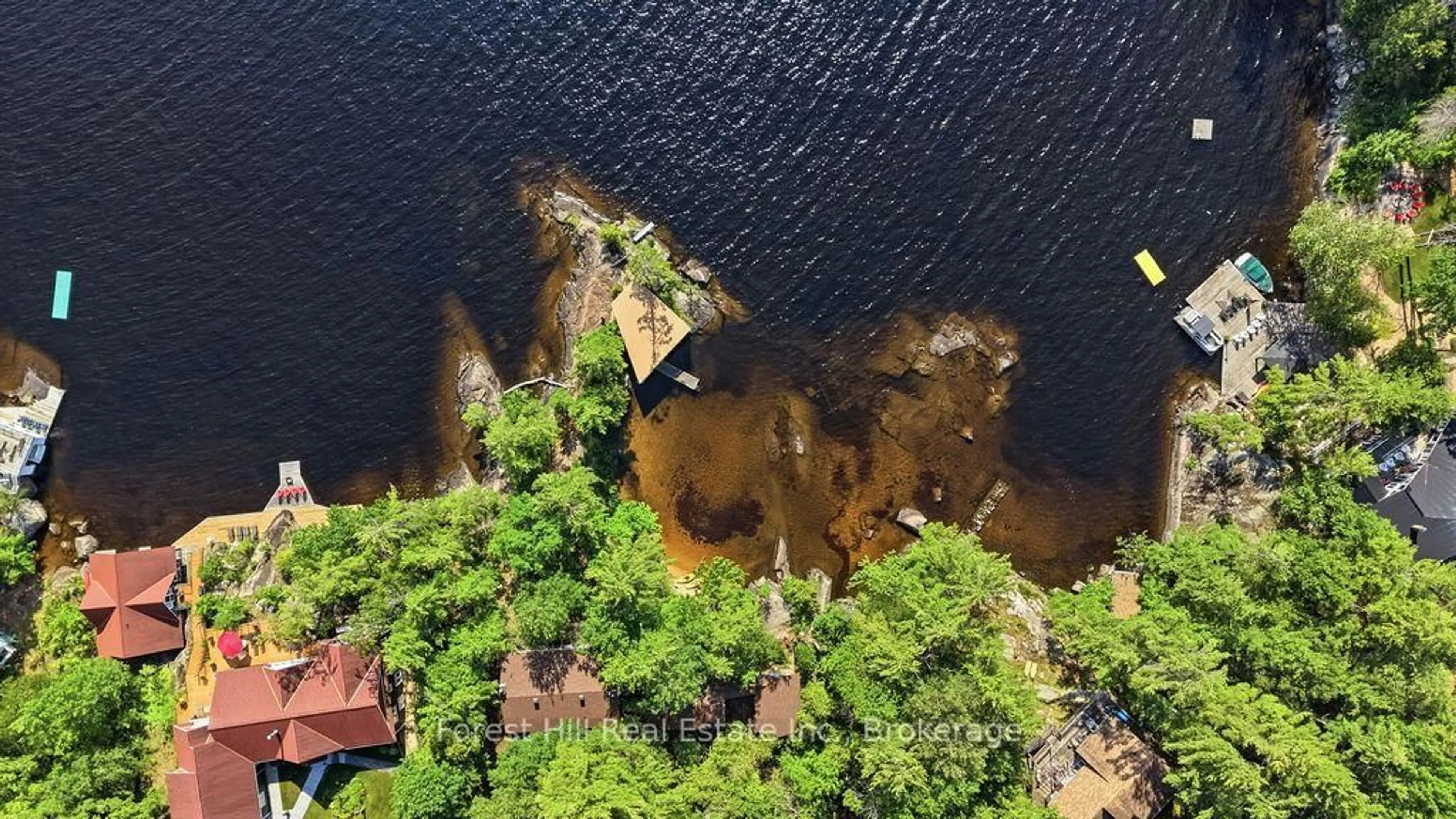 A pic from outside/outdoor area/front of a property/back of a property/a pic from drone, water/lake/river/ocean view for 1211 Waldmere Rd, Bracebridge Ontario P1L 1W8
