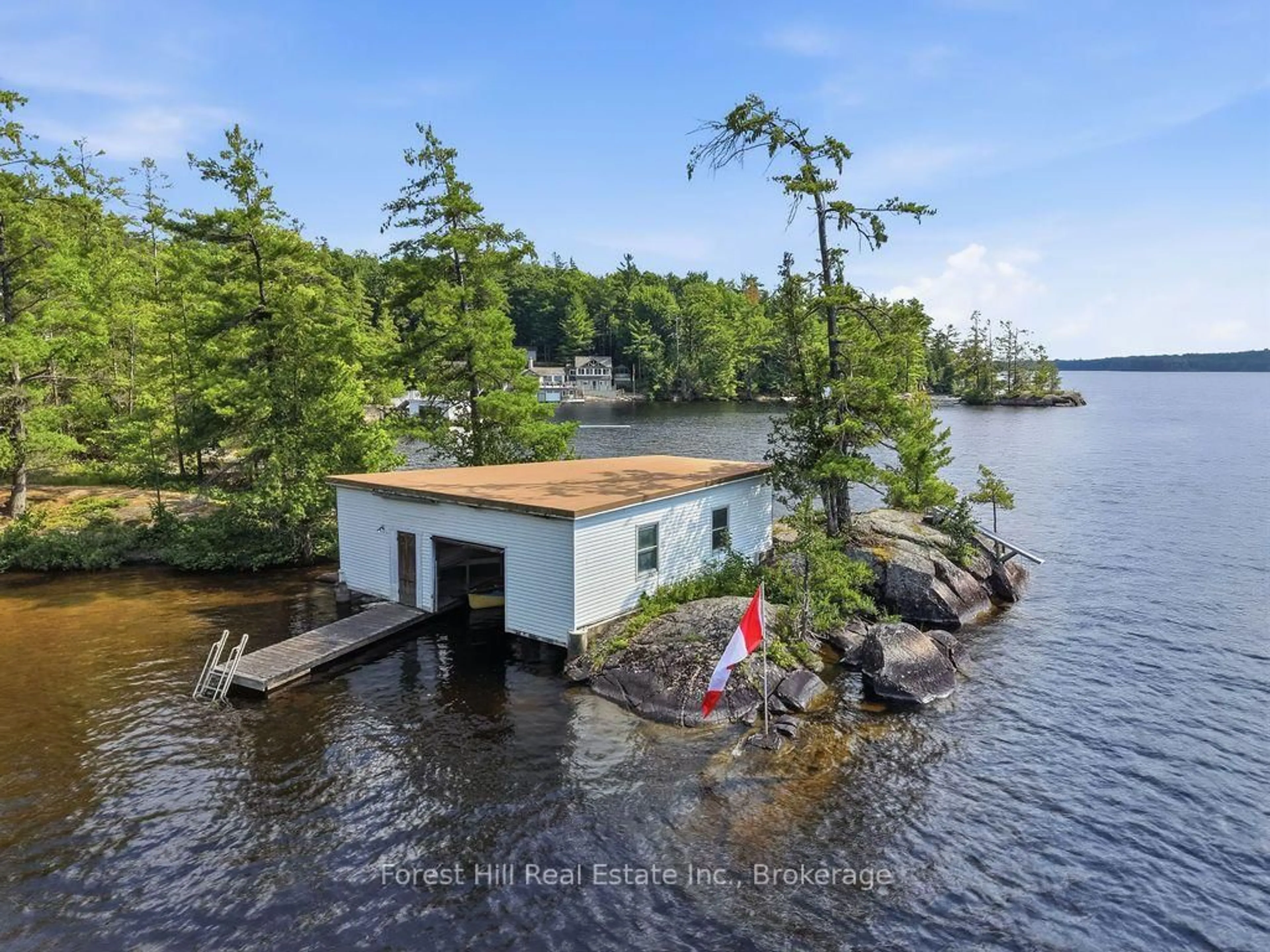 A pic from outside/outdoor area/front of a property/back of a property/a pic from drone, water/lake/river/ocean view for 1211 Waldmere Rd, Bracebridge Ontario P1L 1W8