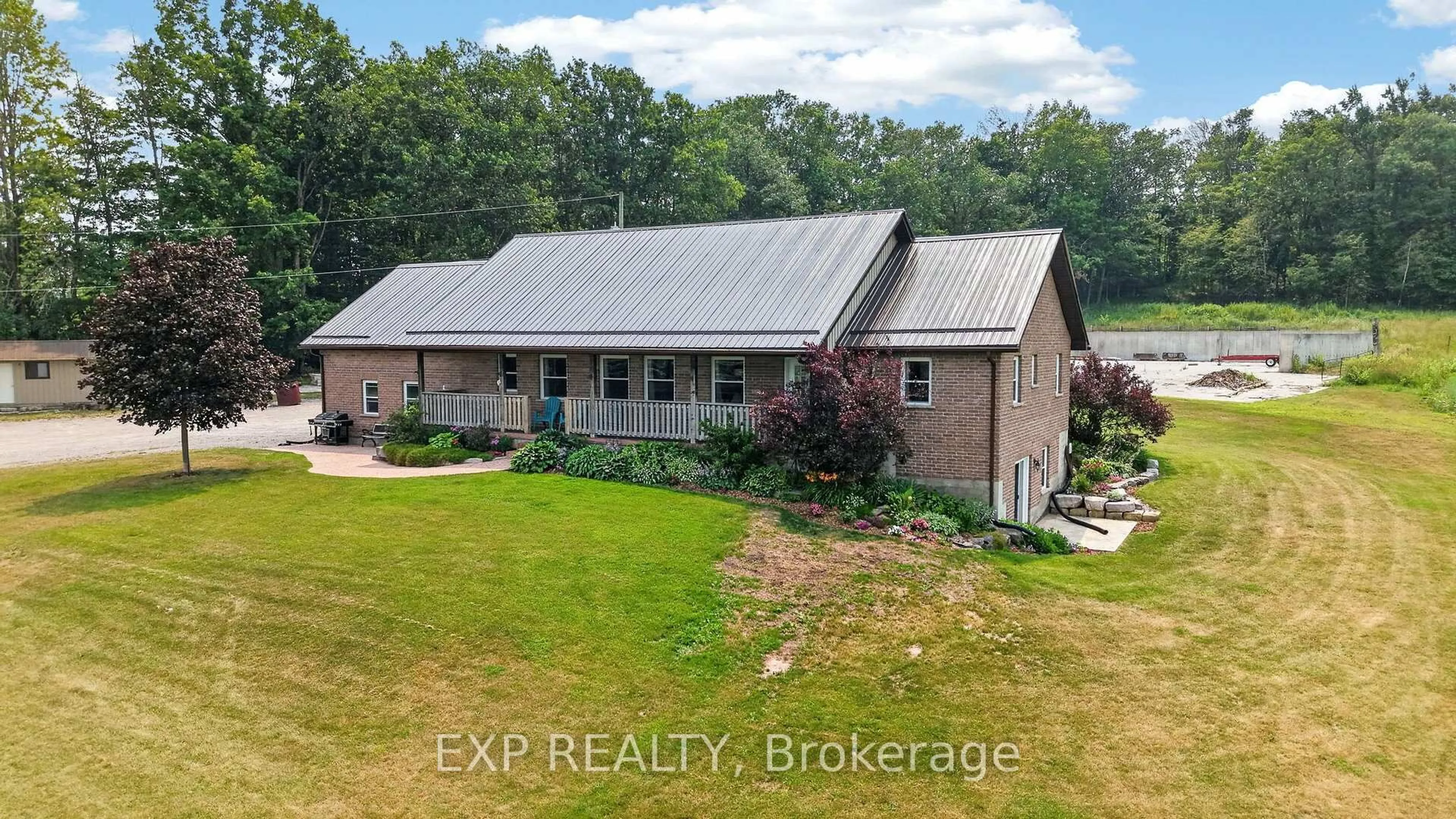 A pic from outside/outdoor area/front of a property/back of a property/a pic from drone, building for 2415 County 46 Rd, Kawartha Lakes Ontario K0M 2T0