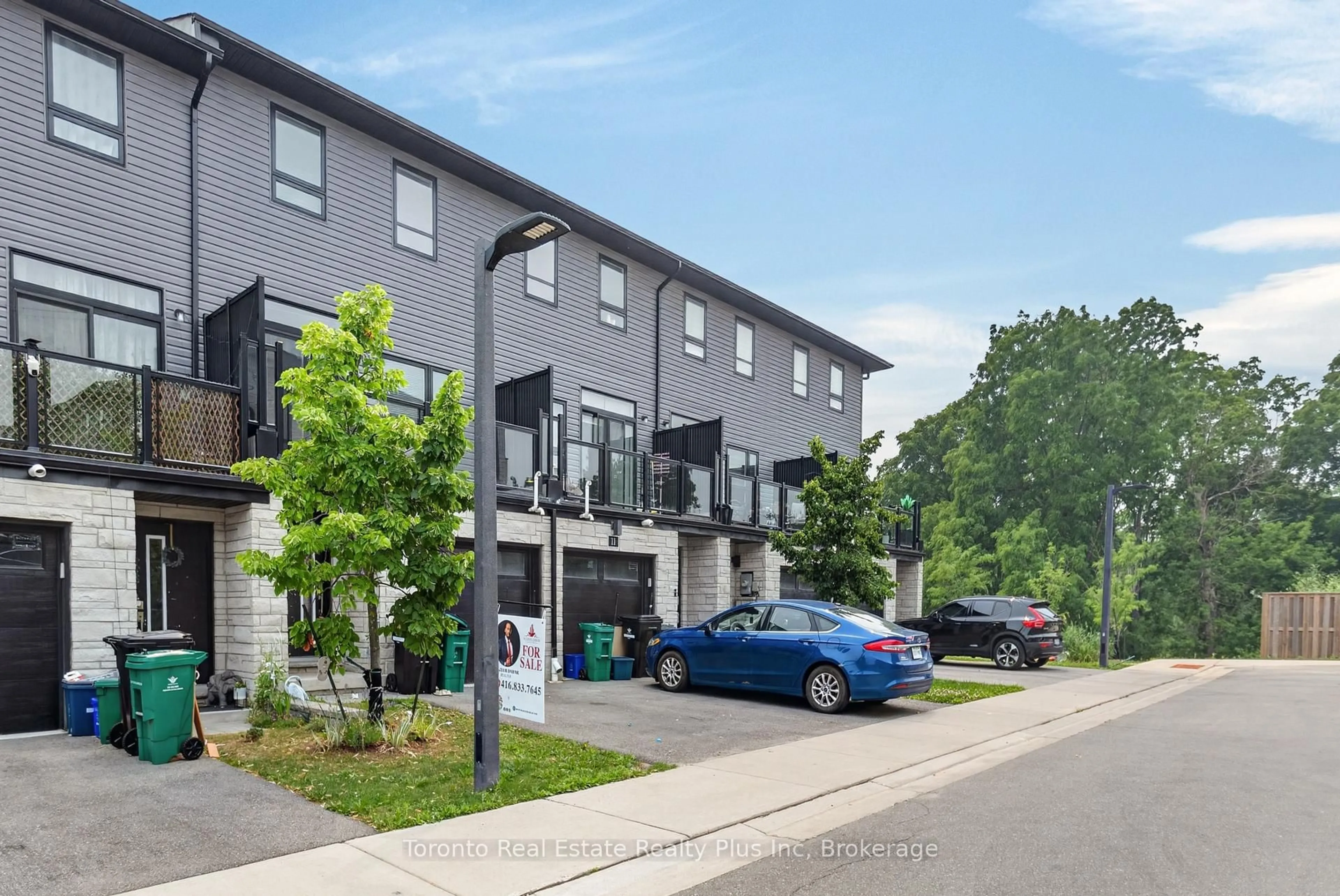 A pic from outside/outdoor area/front of a property/back of a property/a pic from drone, street for 51 Sparrow Ave #10, Cambridge Ontario N1T 2E2