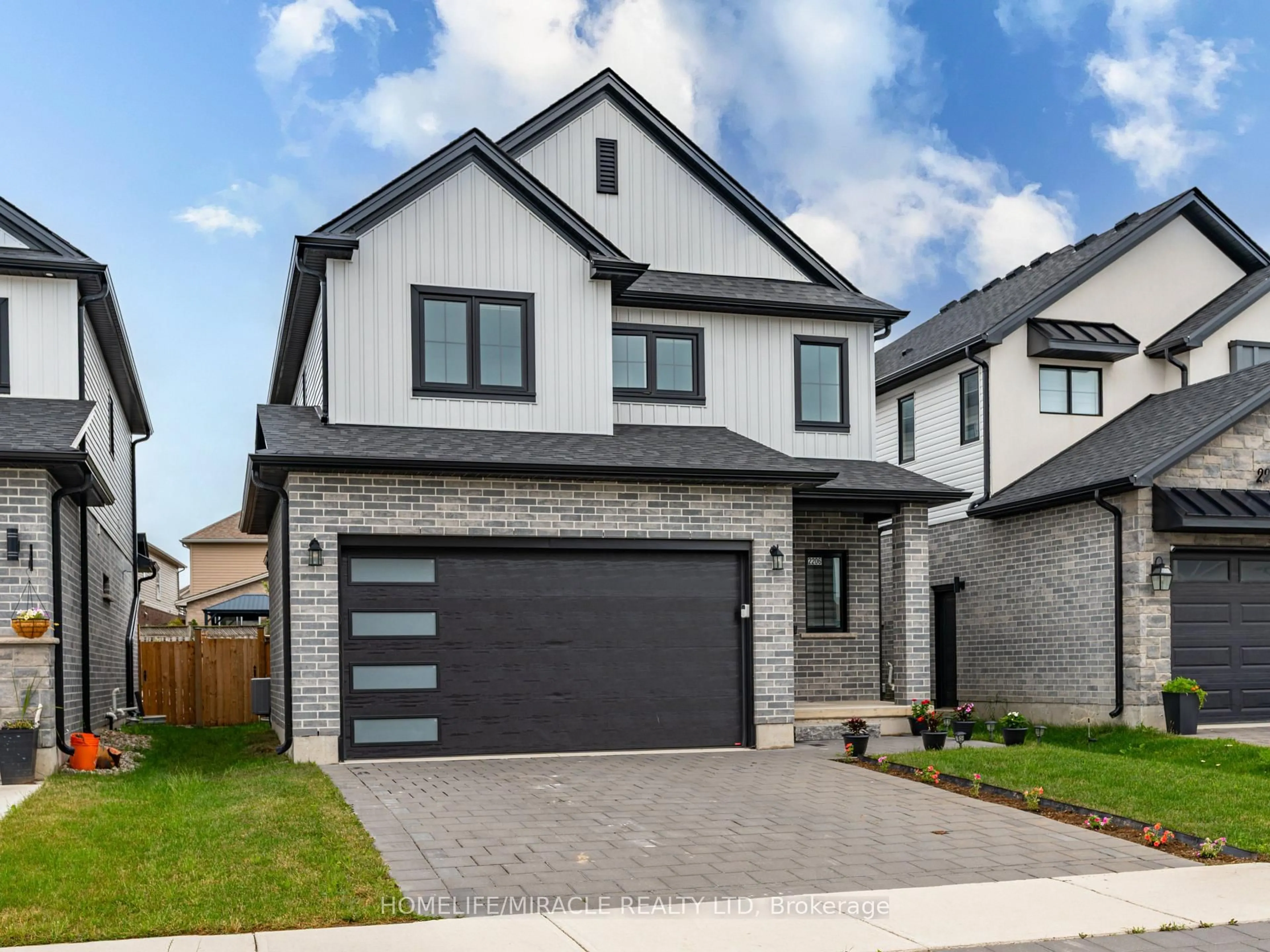 Home with brick exterior material, street for 2206 Southport Cres, London South Ontario N6M 0H9