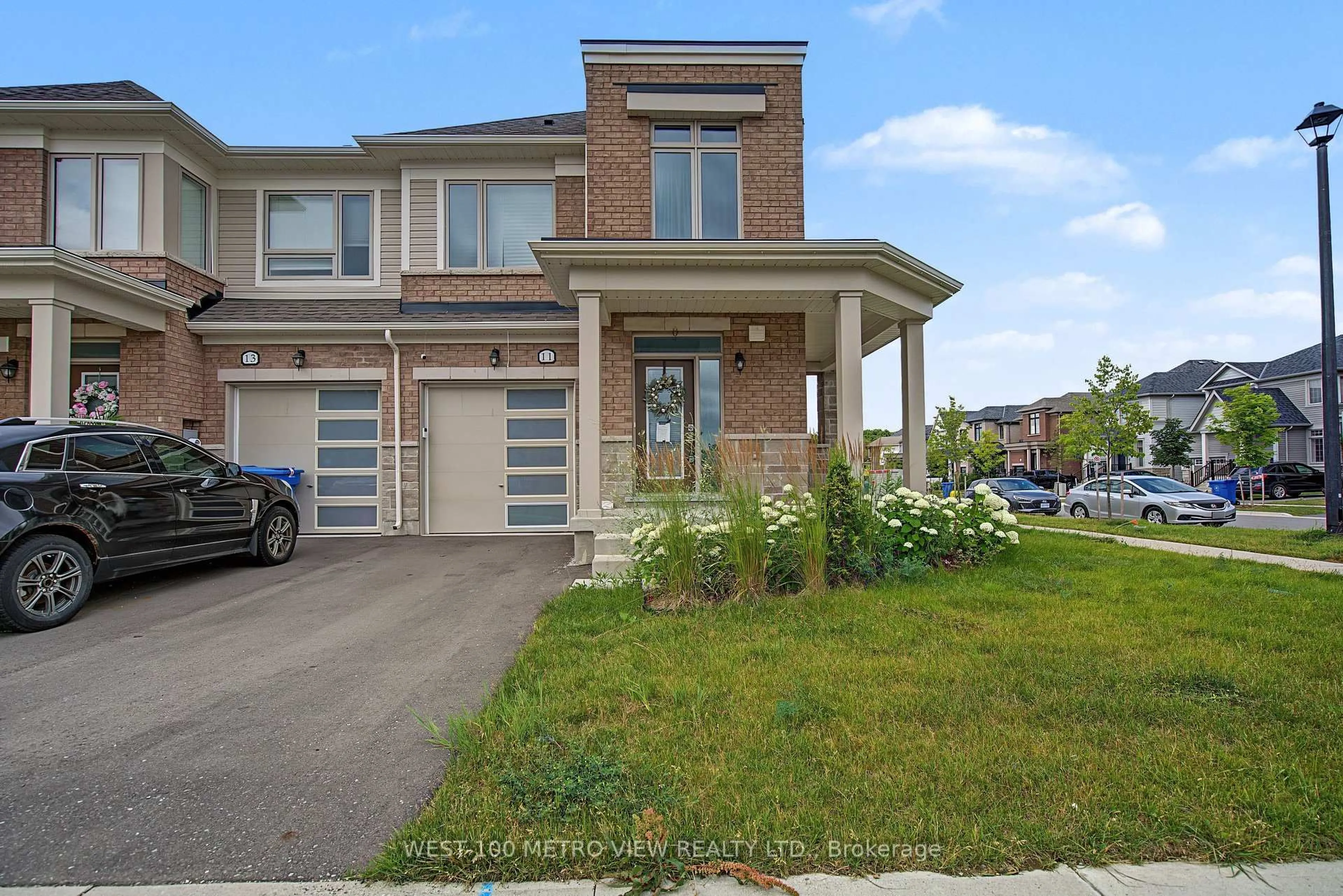 Home with brick exterior material, street for 11 Edminston Dr, Centre Wellington Ontario N1M 0J3