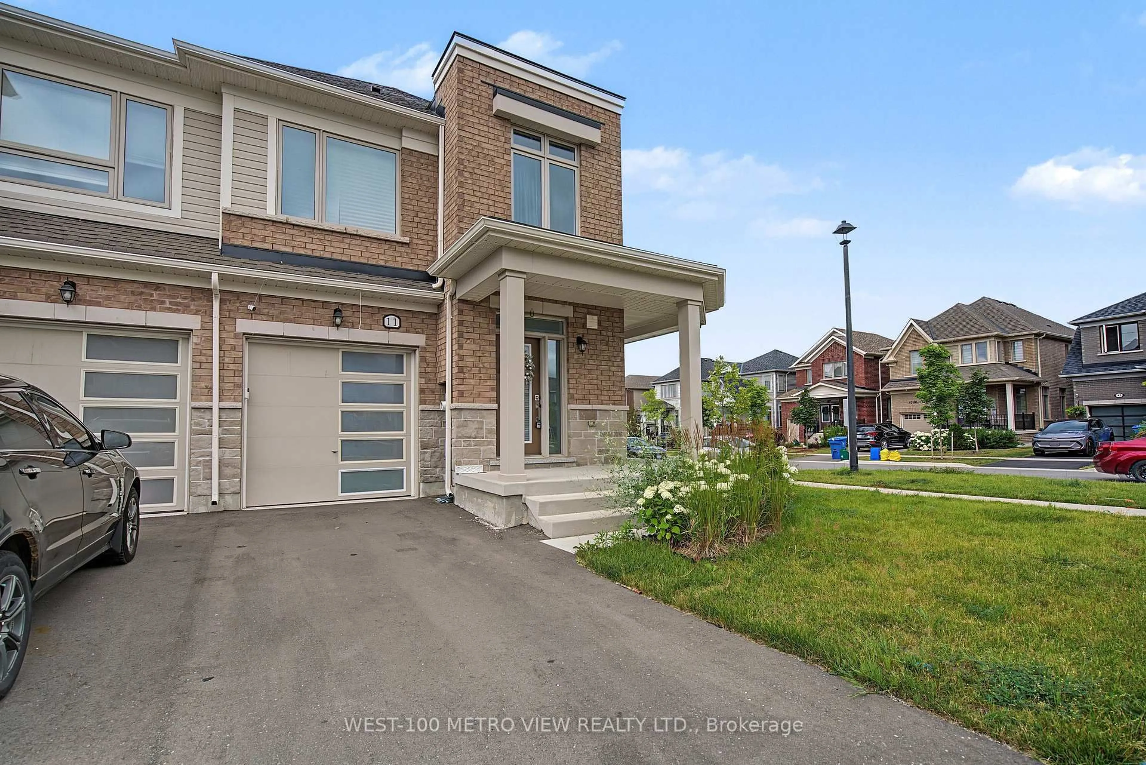 Home with brick exterior material, street for 11 Edminston Dr, Centre Wellington Ontario N1M 0J3