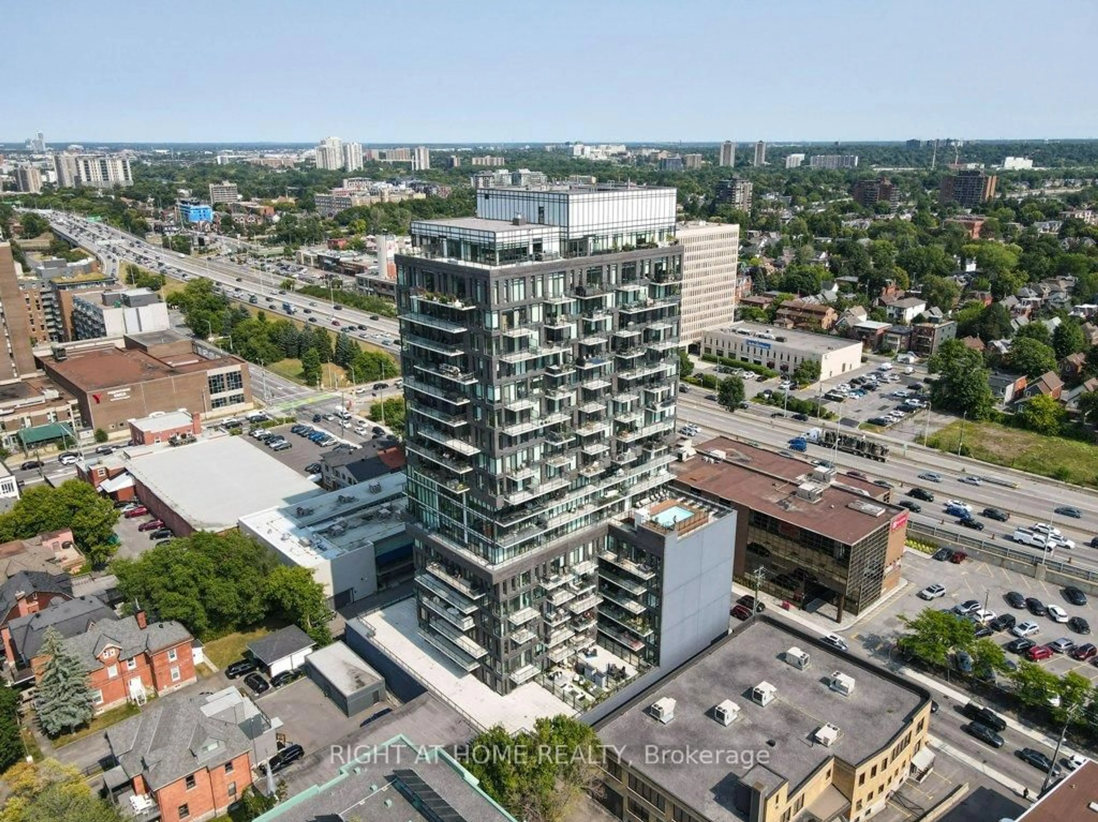 A pic from outside/outdoor area/front of a property/back of a property/a pic from drone, city buildings view from balcony for 203 Catherine St #310, Ottawa Ontario K2P 1J5