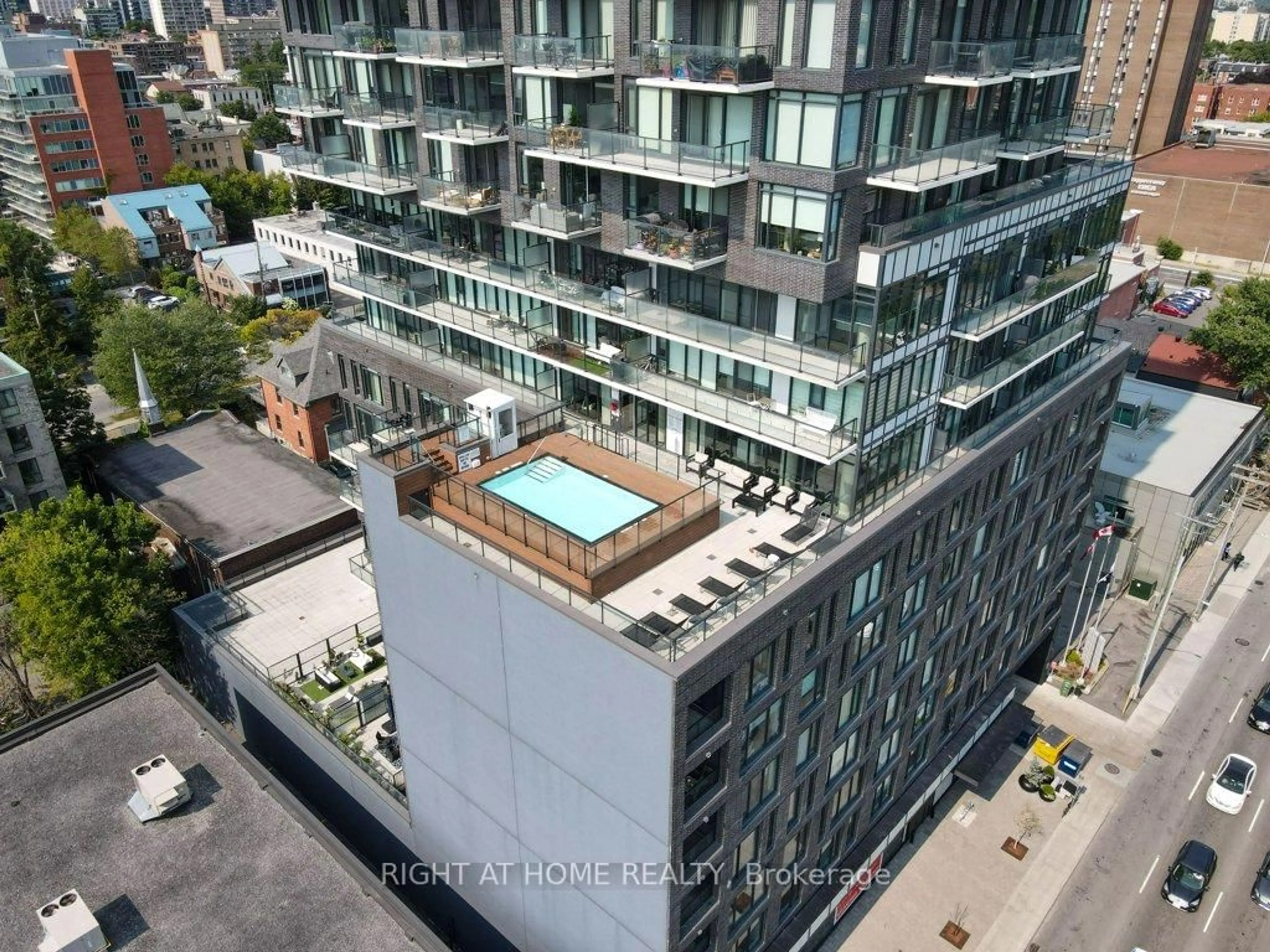 A pic from outside/outdoor area/front of a property/back of a property/a pic from drone, city buildings view from balcony for 203 Catherine St #310, Ottawa Ontario K2P 1J5