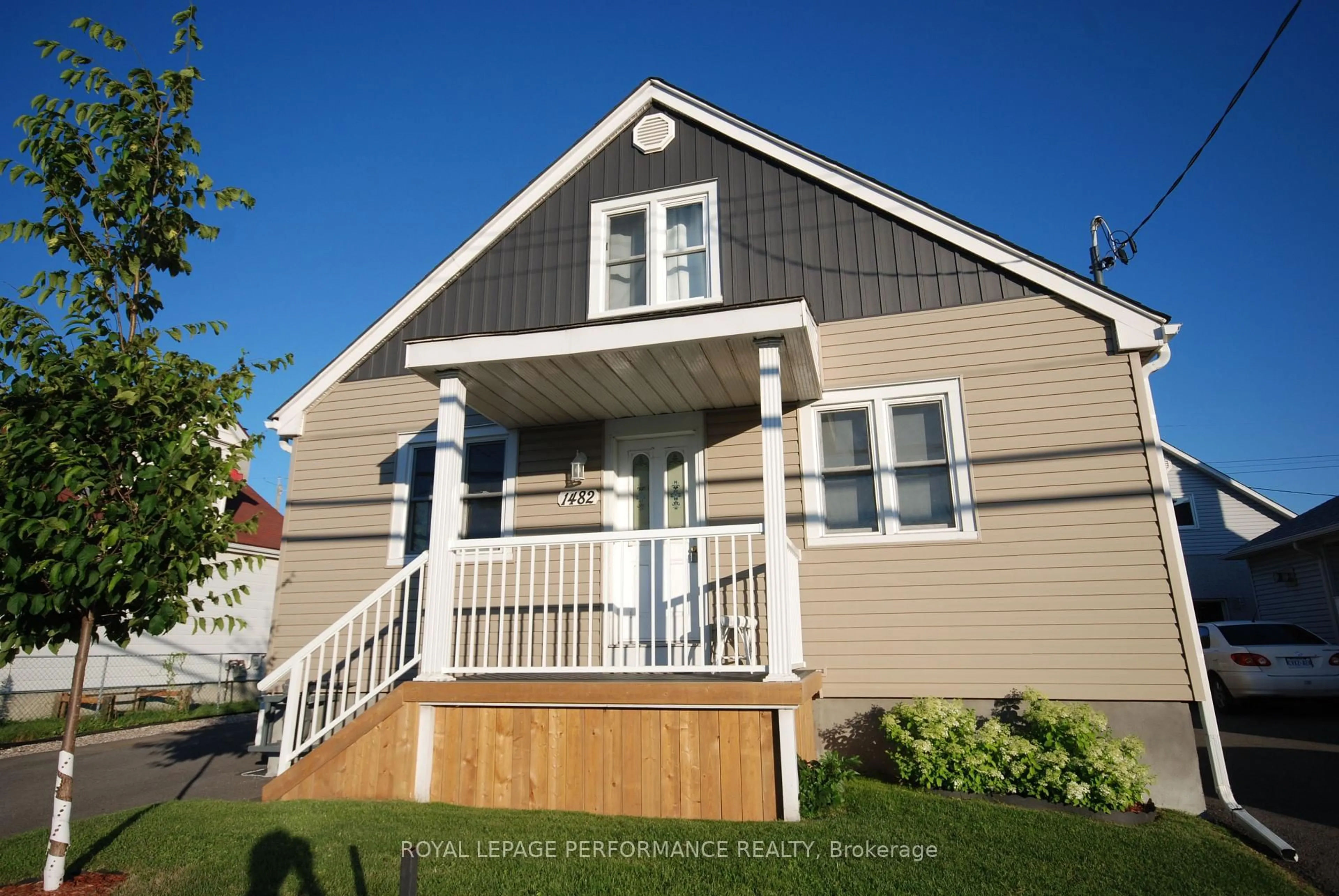Home with vinyl exterior material, street for 1482 Laperriere Ave, Ottawa Ontario K1Z 7S9