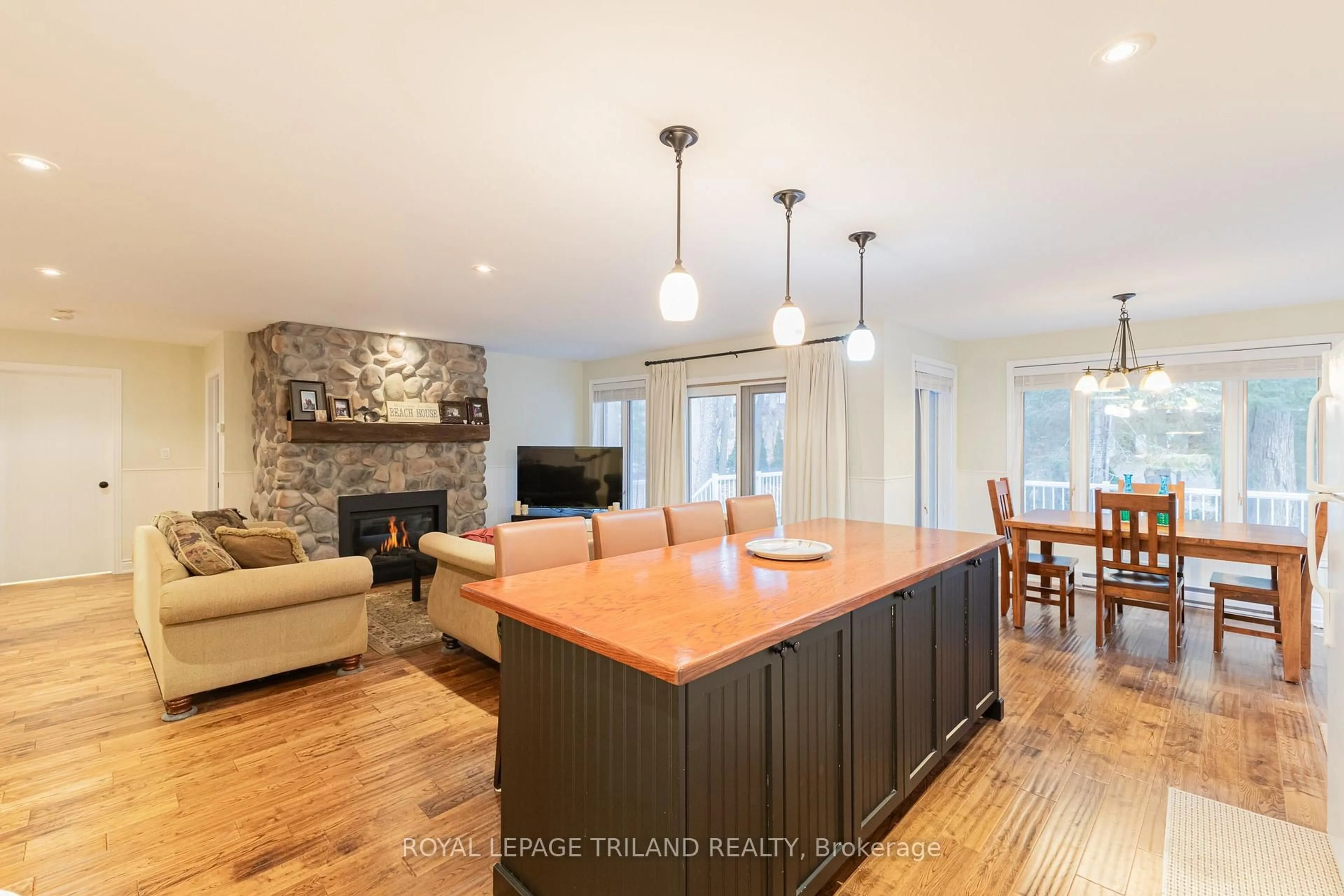 Open concept kitchen, wood/laminate floor for 33 Forest Ave, South Huron Ontario N0M 1T0
