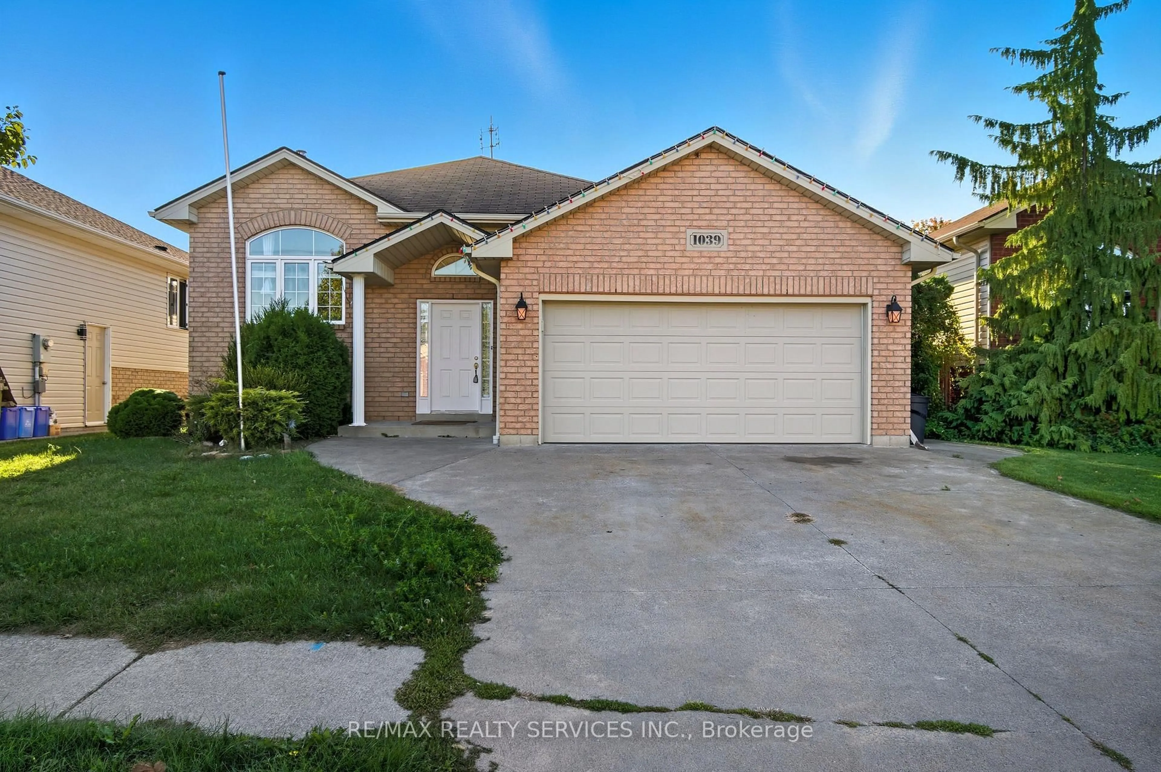 Home with brick exterior material, street for 1039 Clover Ave, Windsor Ontario N8P 1V8