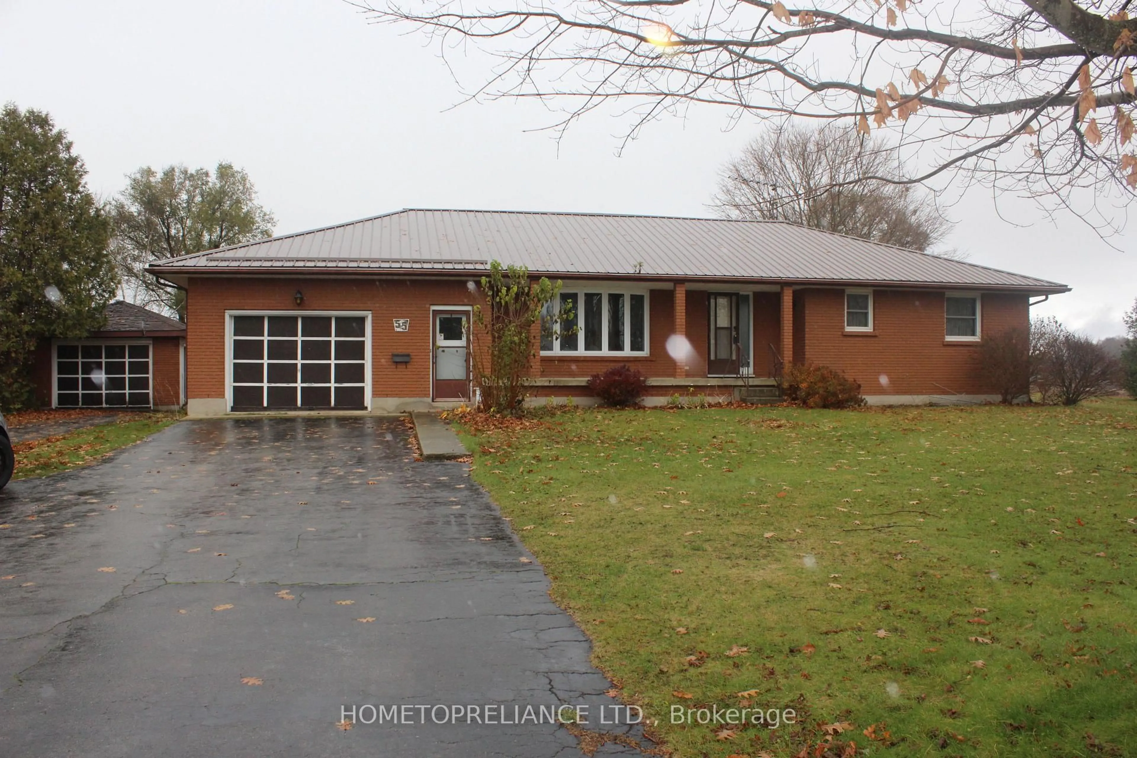 Home with brick exterior material, street for 55 Wellington St, Bayham Ontario N0J 1T0