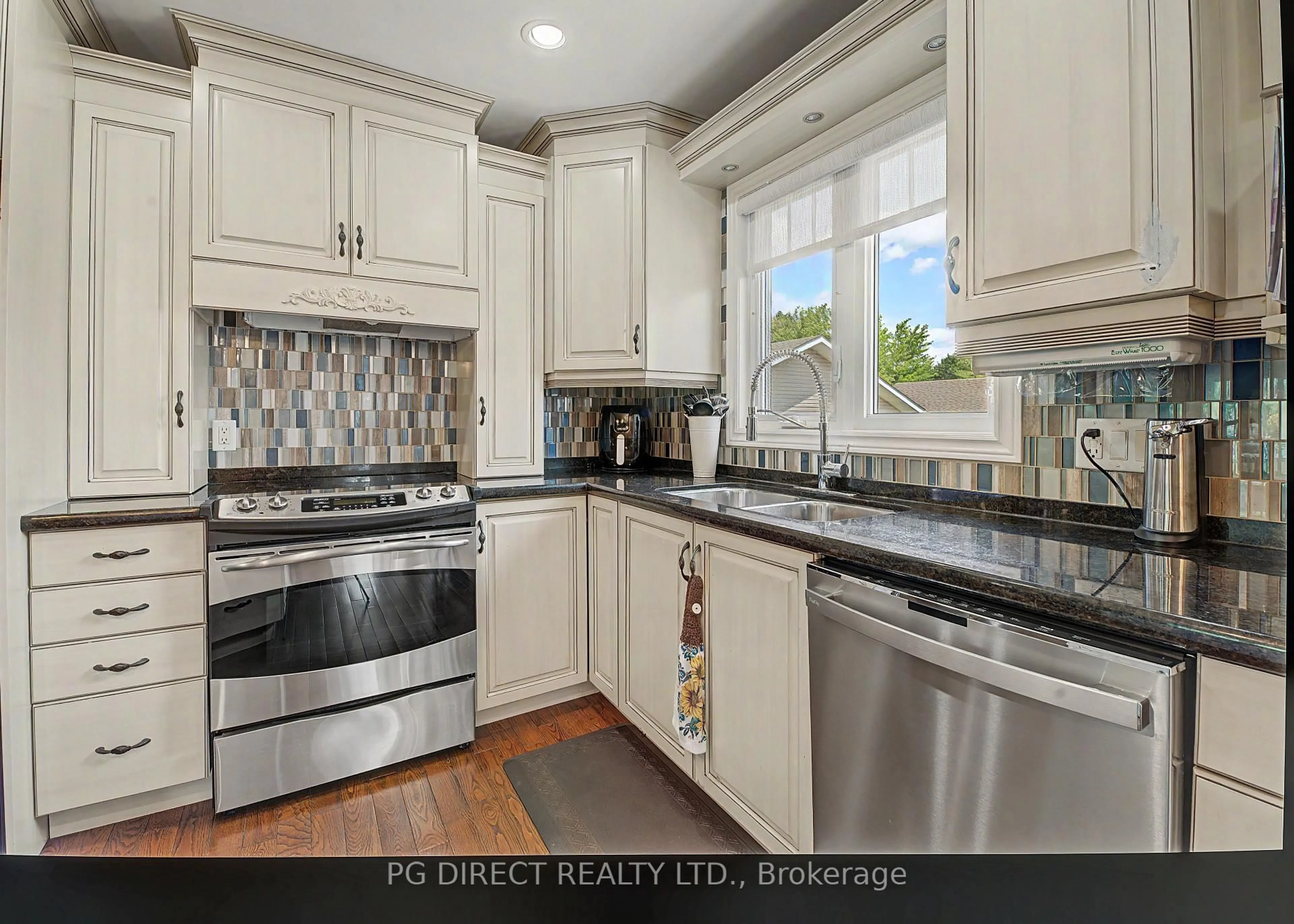 Open concept kitchen, ceramic/tile floor for 161 Spruce Crt, West Nipissing Ontario P2B 3N6
