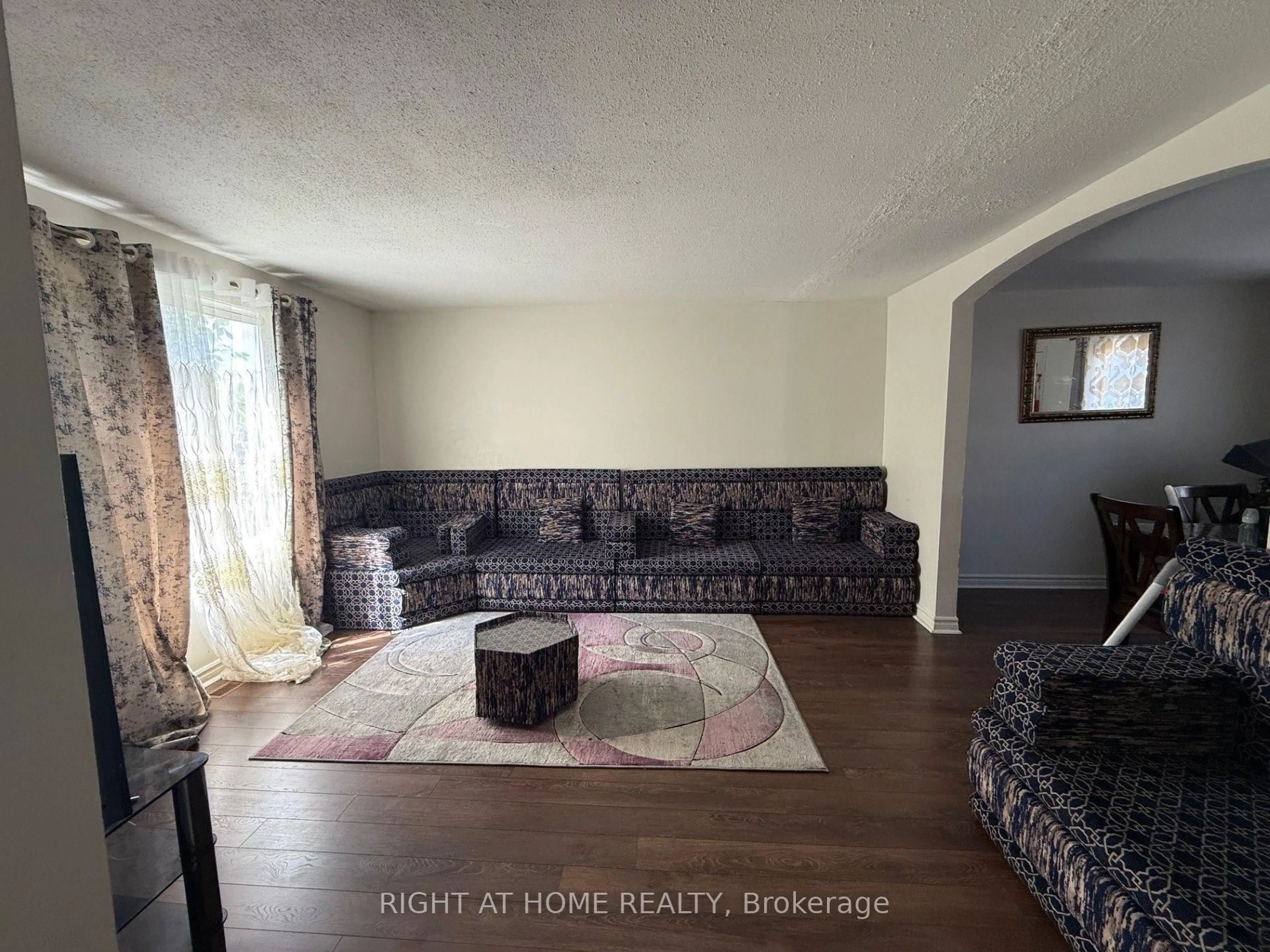 Living room with furniture, unknown for 1552 Beaverpond Dr #B, Ottawa Ontario K1B 3R9